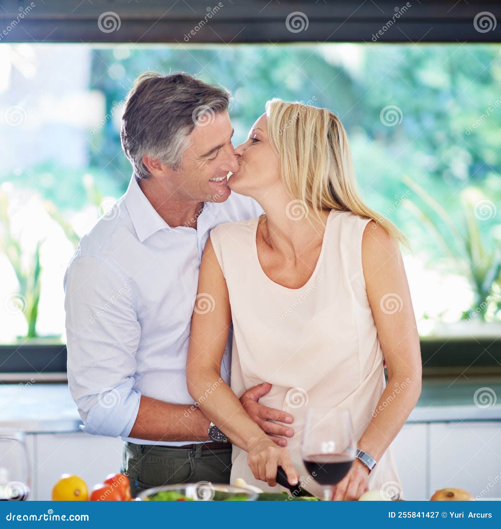 Kitchen Romance. an Affectionate Couple Cooking Dinner. Stock Image ...