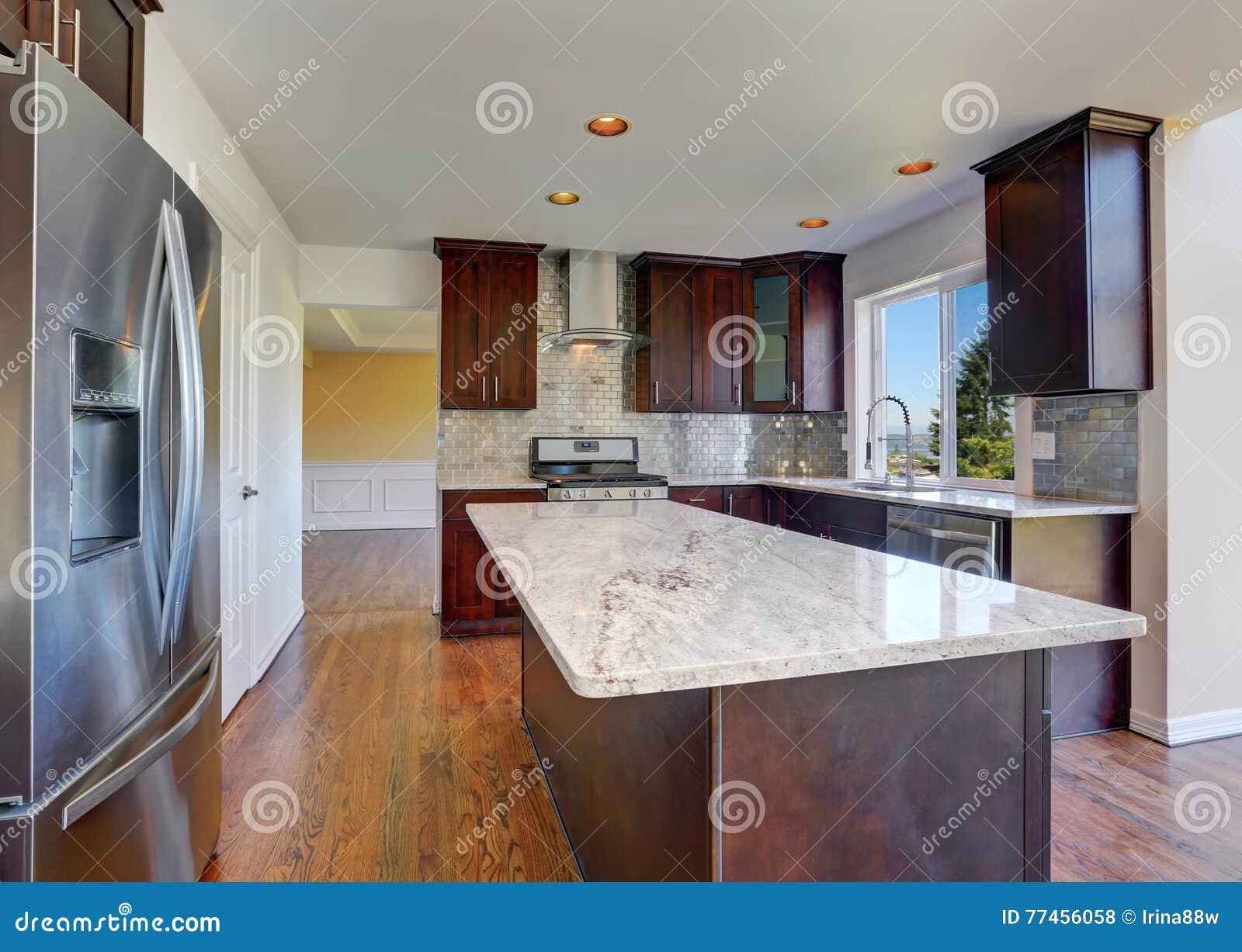 kitchen room interior with deep brown cabinets with granite counter top