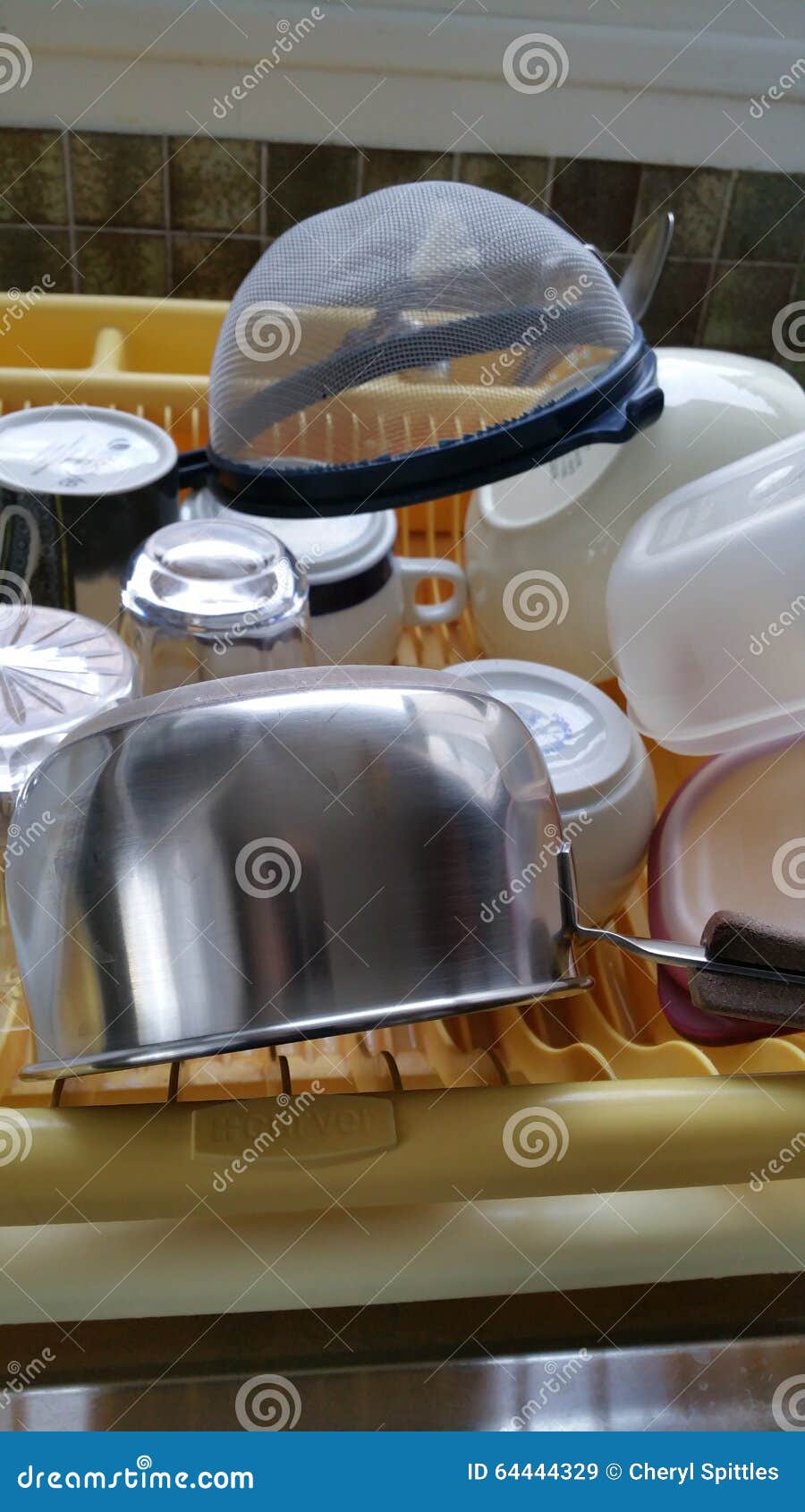 Pans and Crockery Draining on Kitchen Sink Draining Board Stock Image