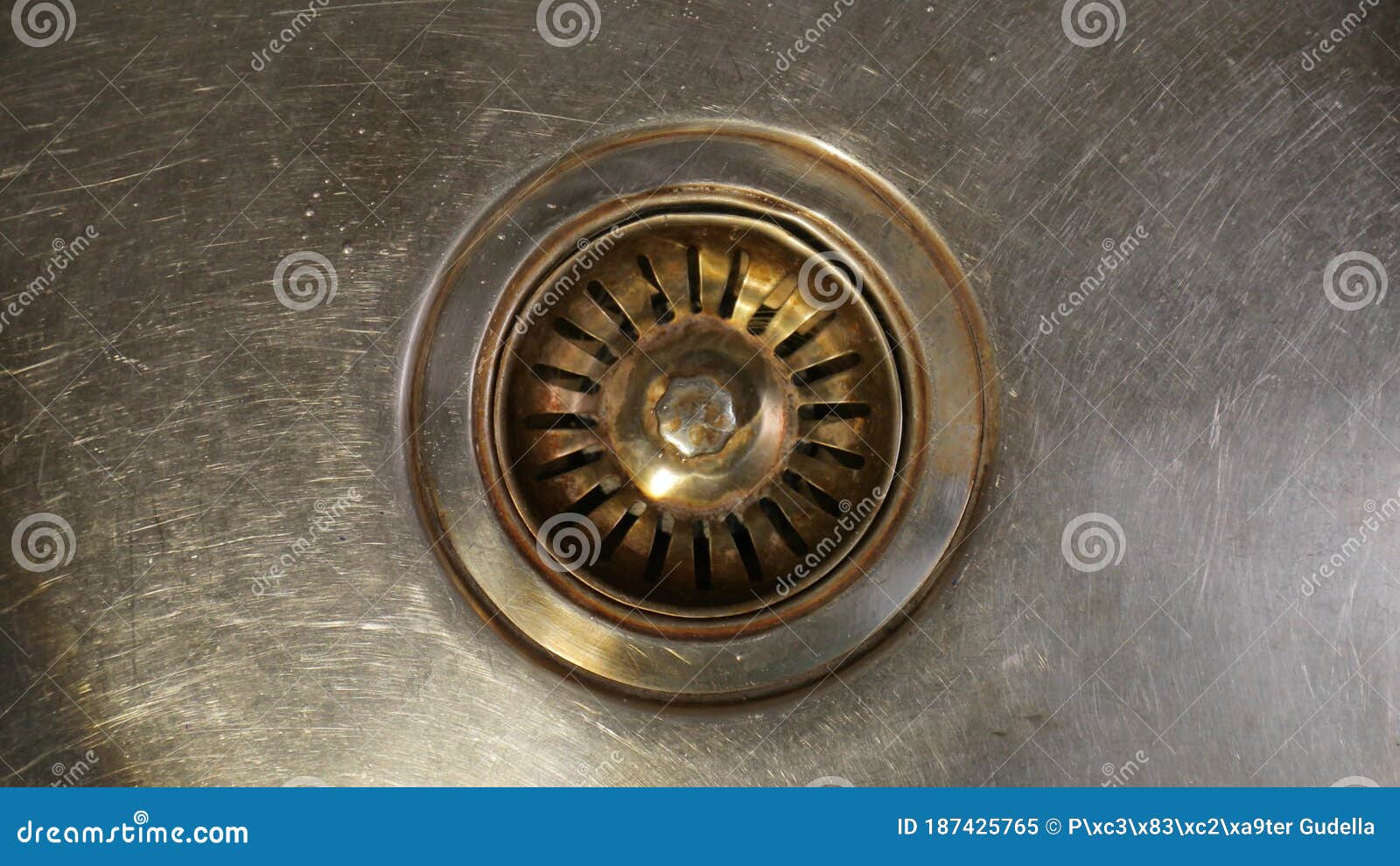 unplugging kitchen sink drain