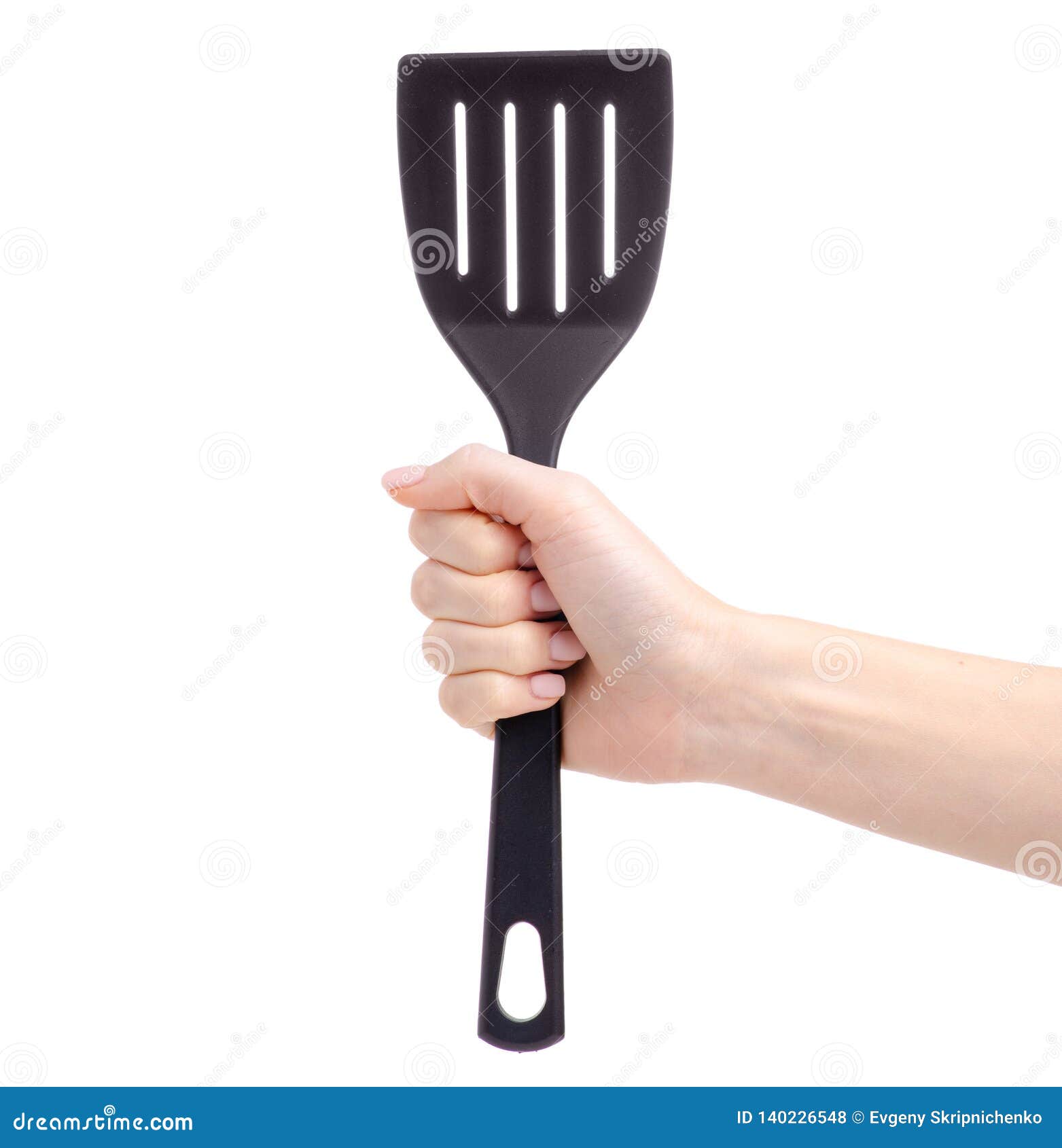 Kitchen spatula in hand stock photo. Image of household 140226548