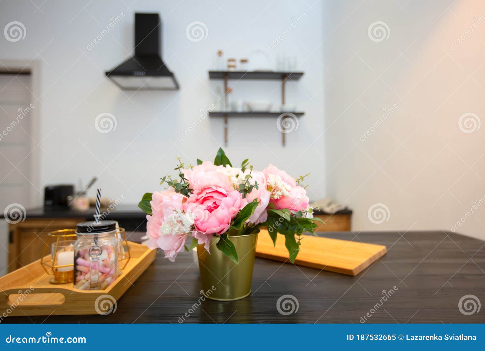 Kitchen table with flowers stock image. Image of interior 187532665
