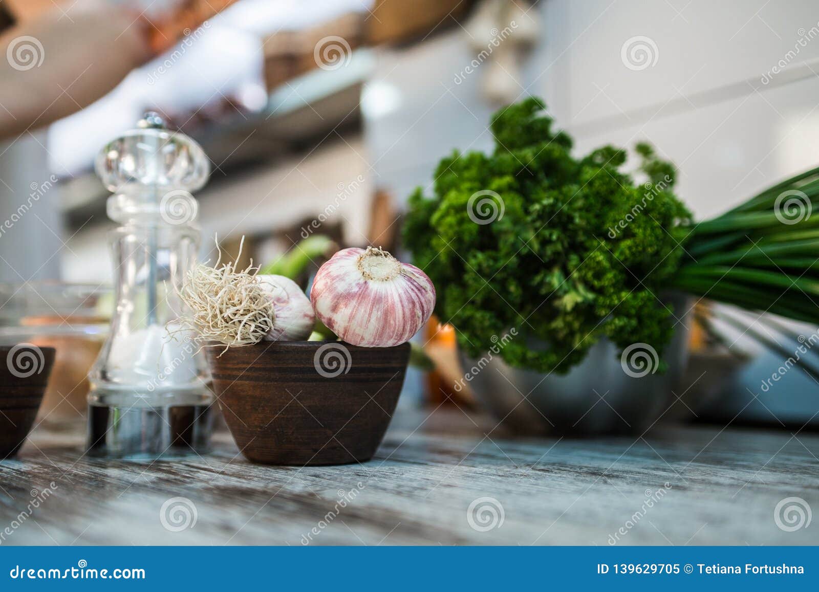 Kitchen table with garlic stock image. Image of nwet 139629705