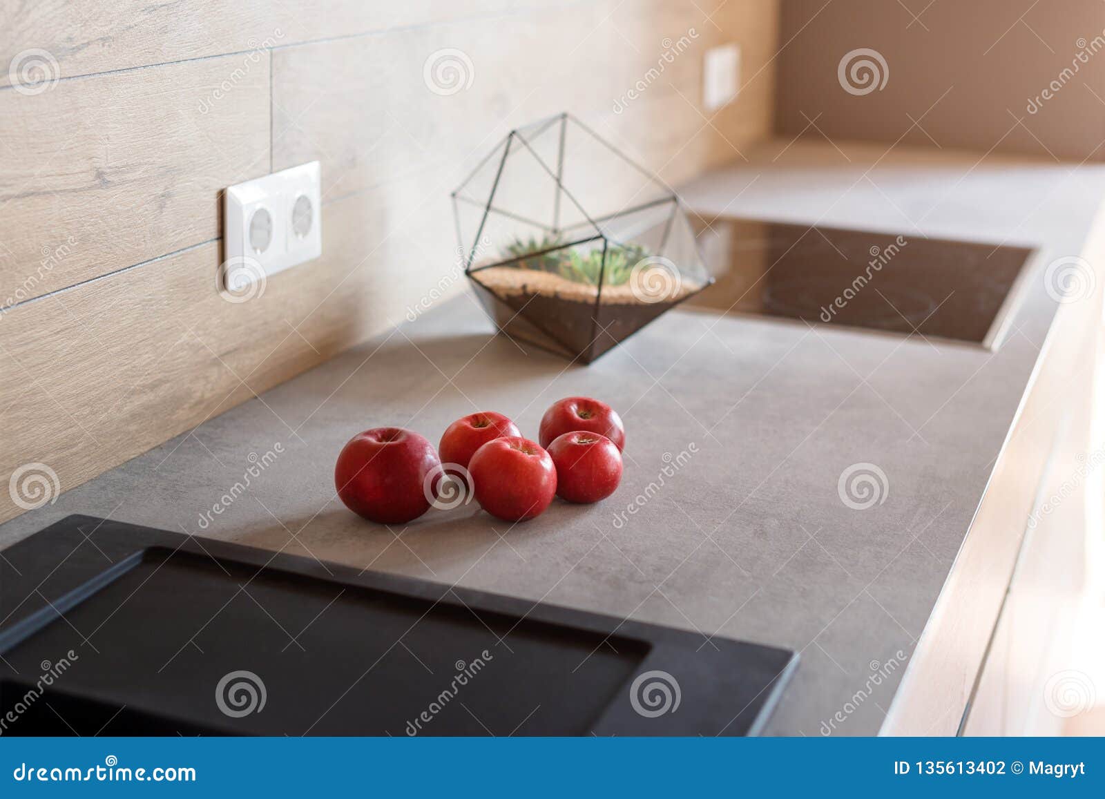 Kitchen Table with Red Apples. Modern Kitchen Interior, Close Up Stock