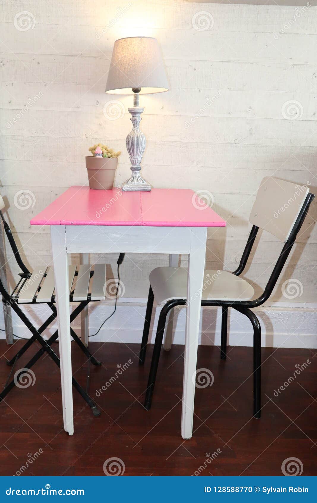 Kitchen Table And Two Chairs In A Minimalist Concept Stock Photo