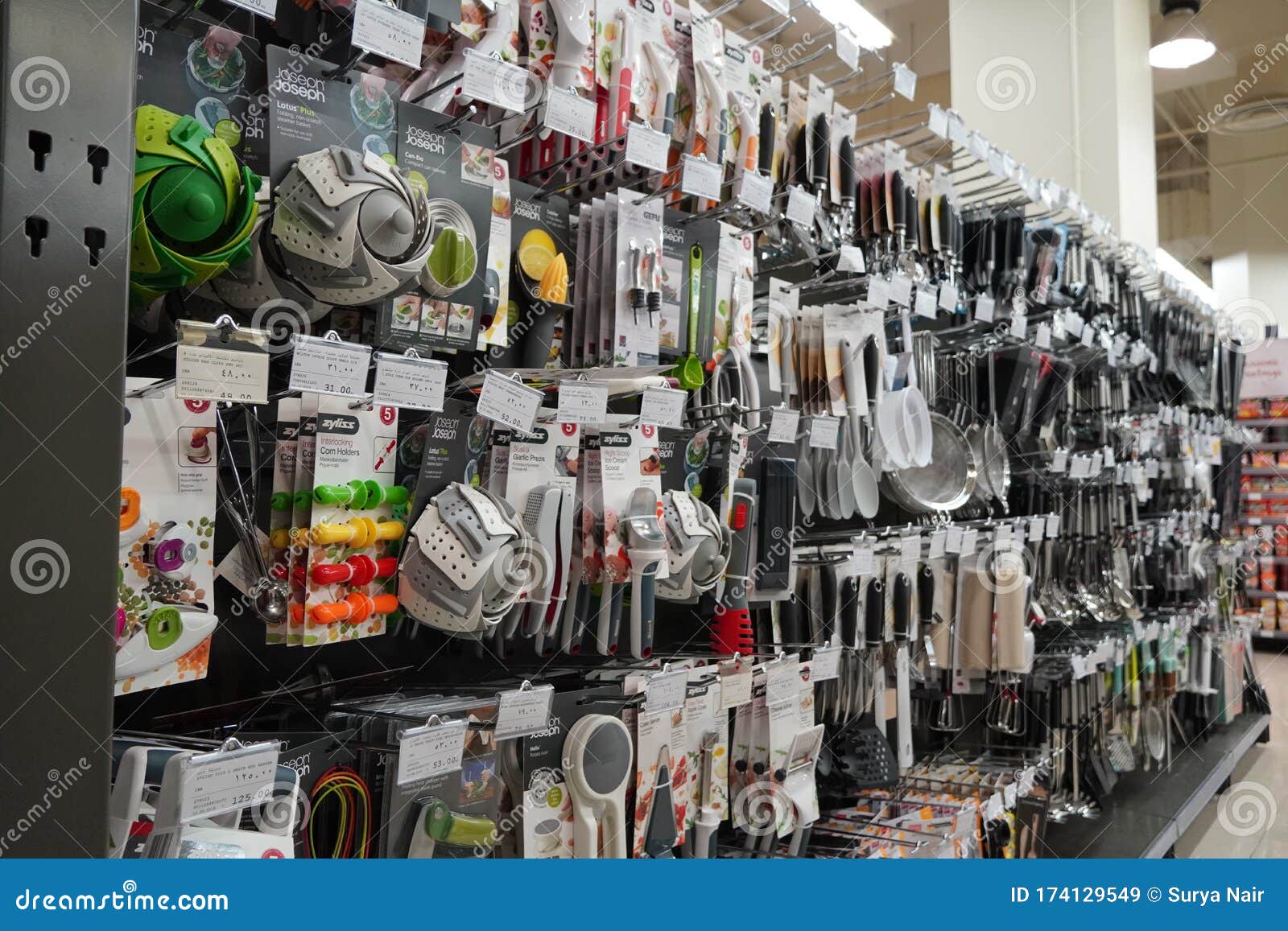 Kitchen Tools Hanging in Shop. Large Set and Variety of Different ...