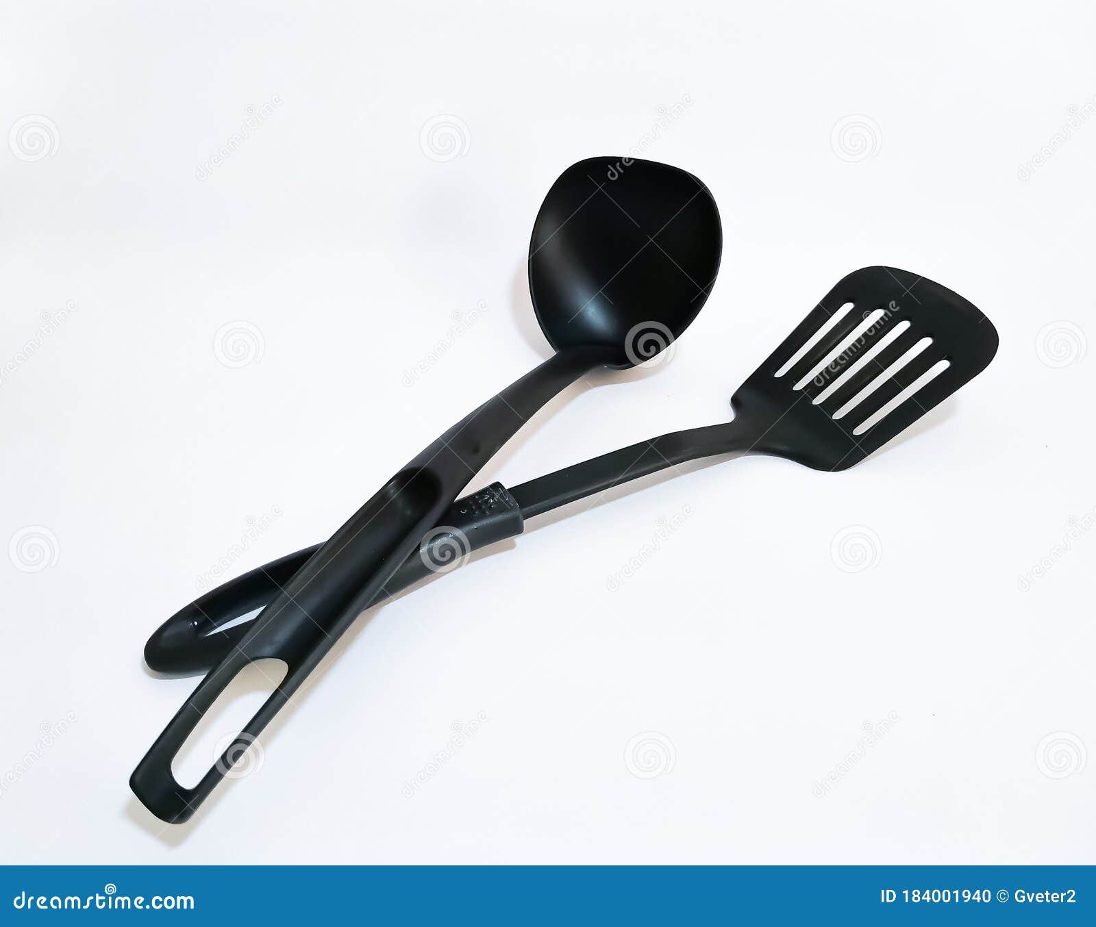 Black Plastic Kitchen Spatula and Ladle on a White Background Stock