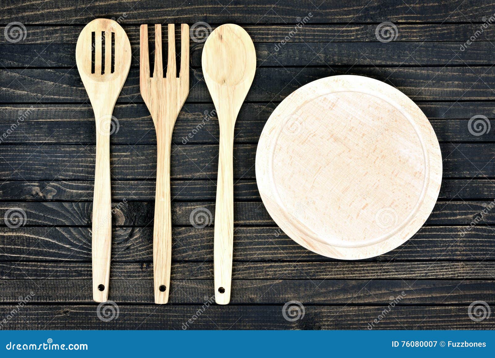 Kitchen utensils on table stock image. Image of cutlery 76080007
