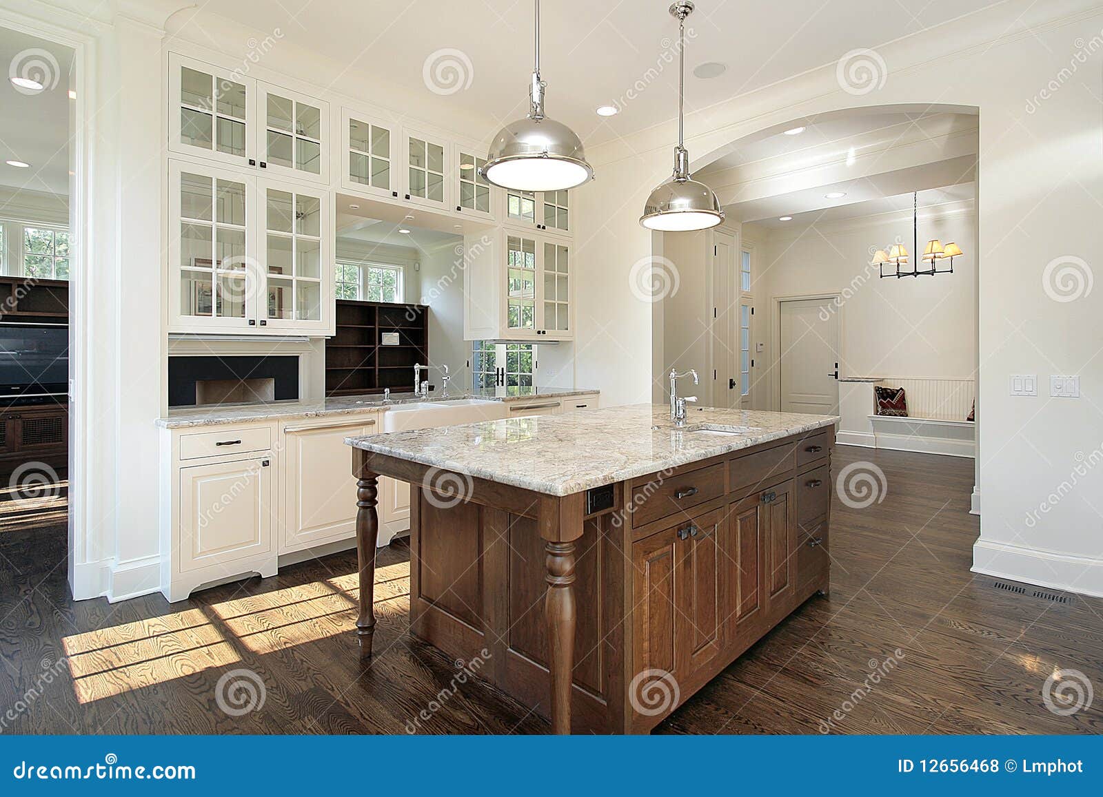 Kitchen With White Wood Cabinetry Stock Photo - Image of home, counter