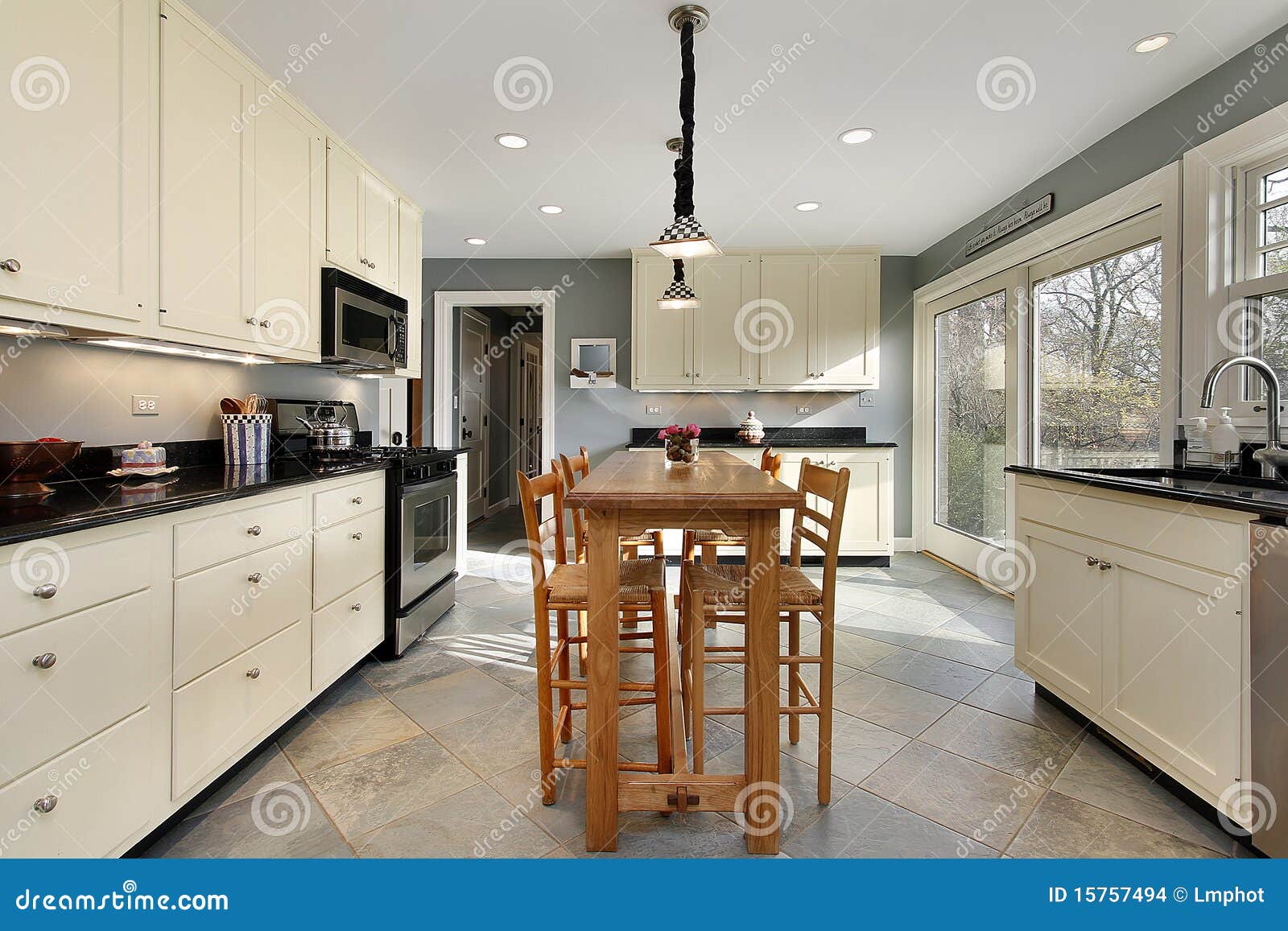 Kitchen with wooden table stock photo. Image of dining 15757494