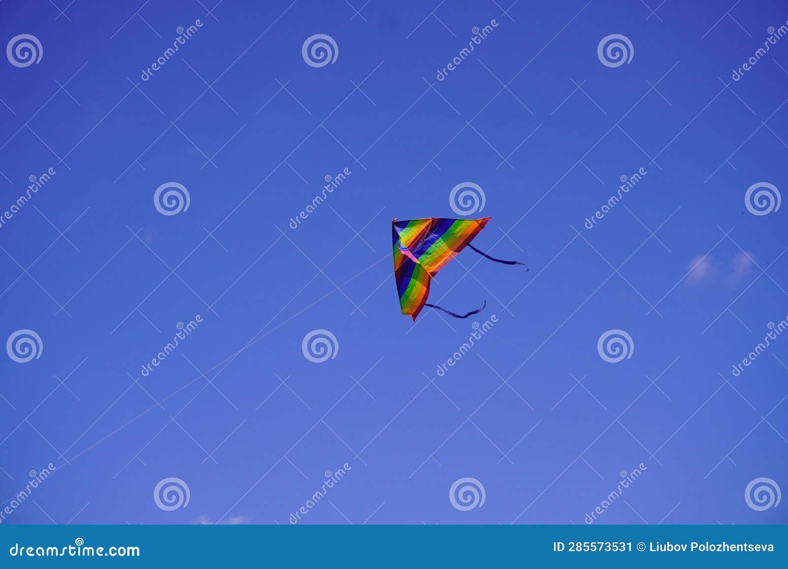 A Kite Flies in the Blue Sky Stock Image Image of blue, childhood