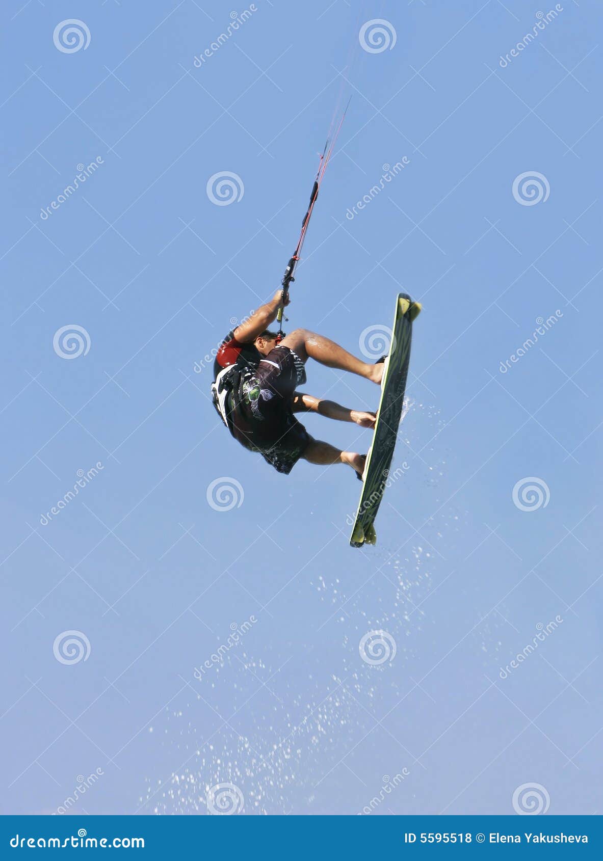 Kite jumper in action stock photo. Image of leisure, kiteboarding 5595518