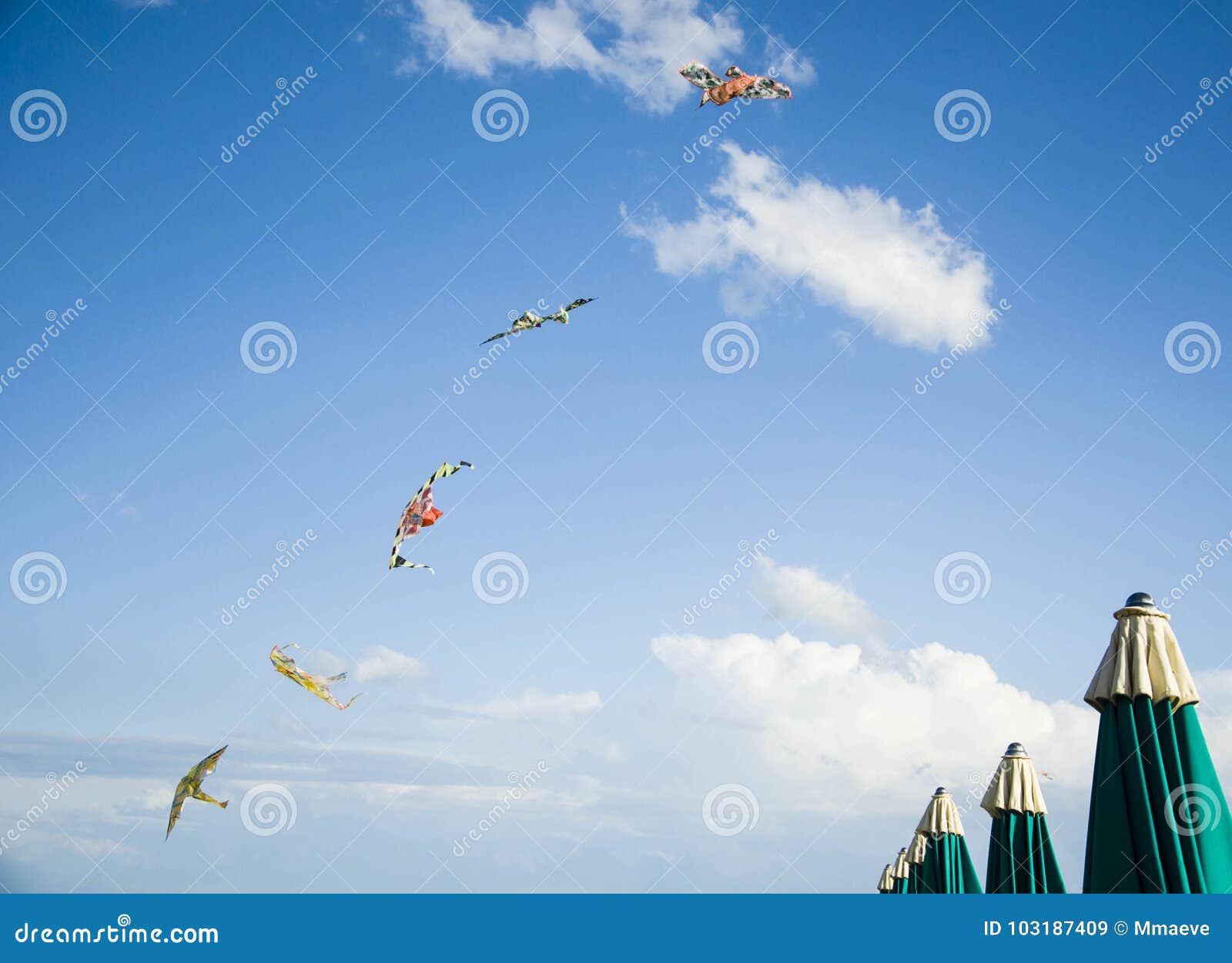 Kites and beach umbrellas stock image. Image of colors 103187409