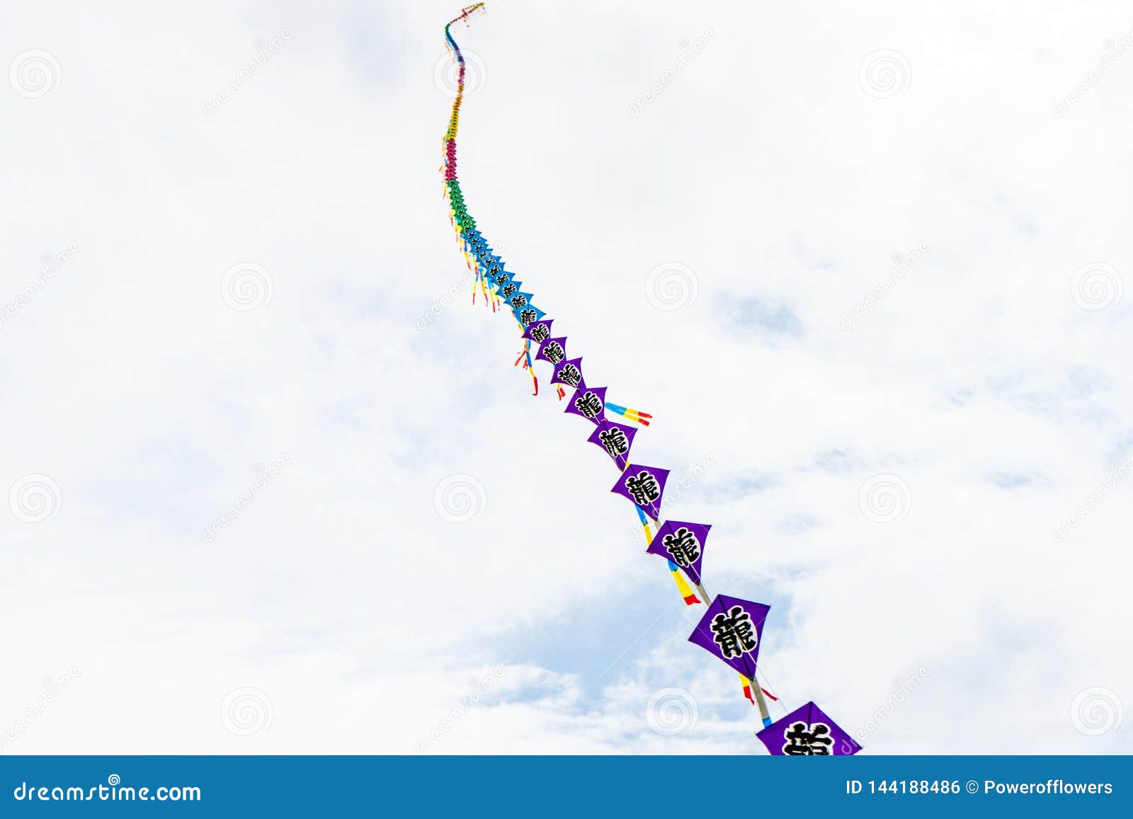 Kites Flying in the Sky among the Clouds.Kite Festival Stock Photo