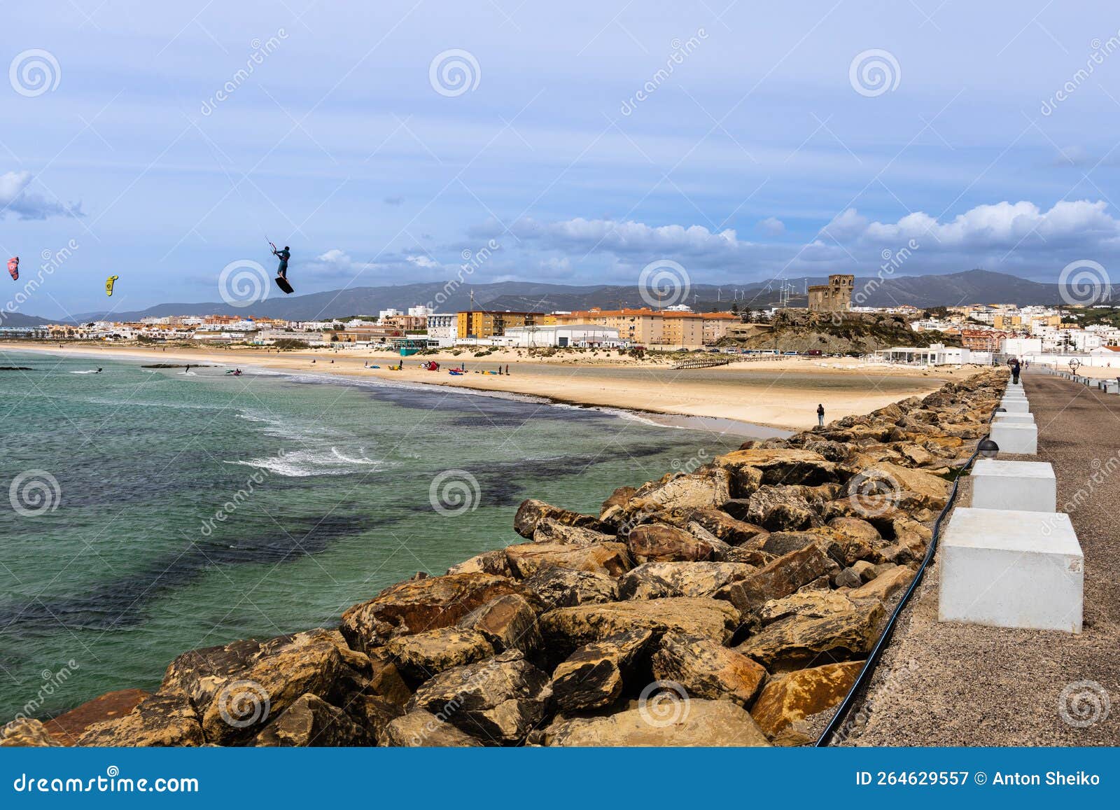 kitesurfers, ocean and beach. tarifa, andalusia, spain