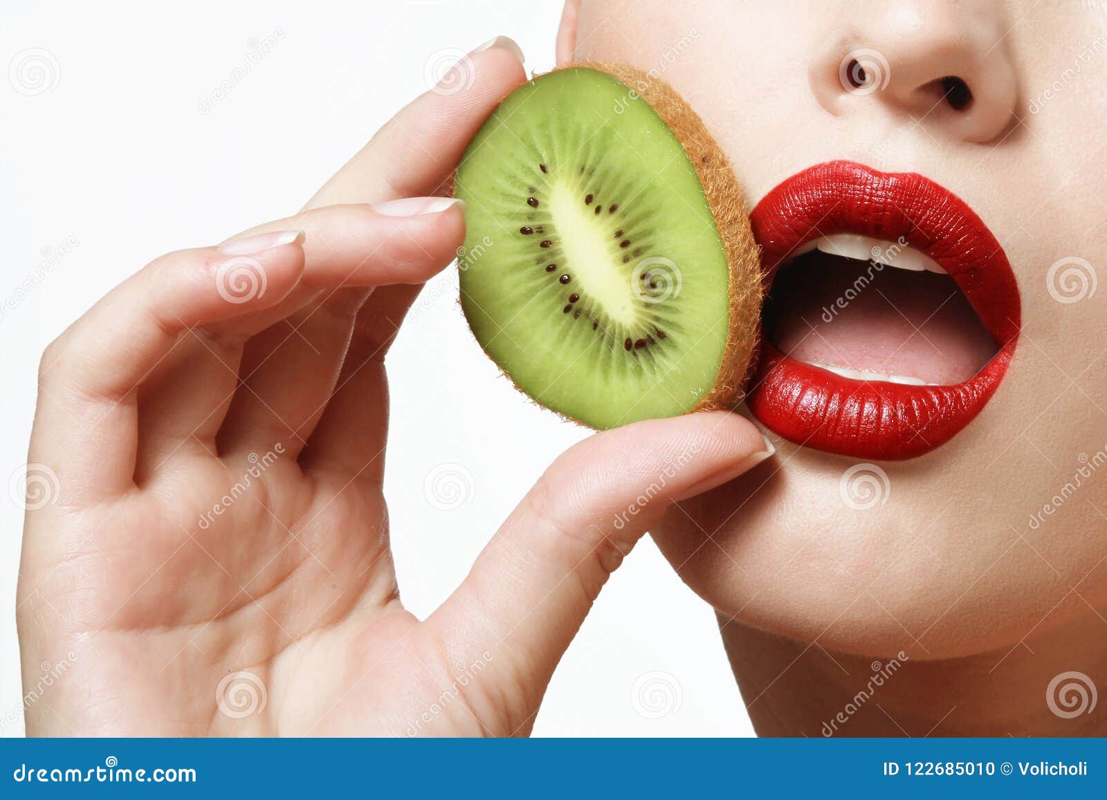 Kiwi and female lips stock photo. Image of cosmetics 122685010