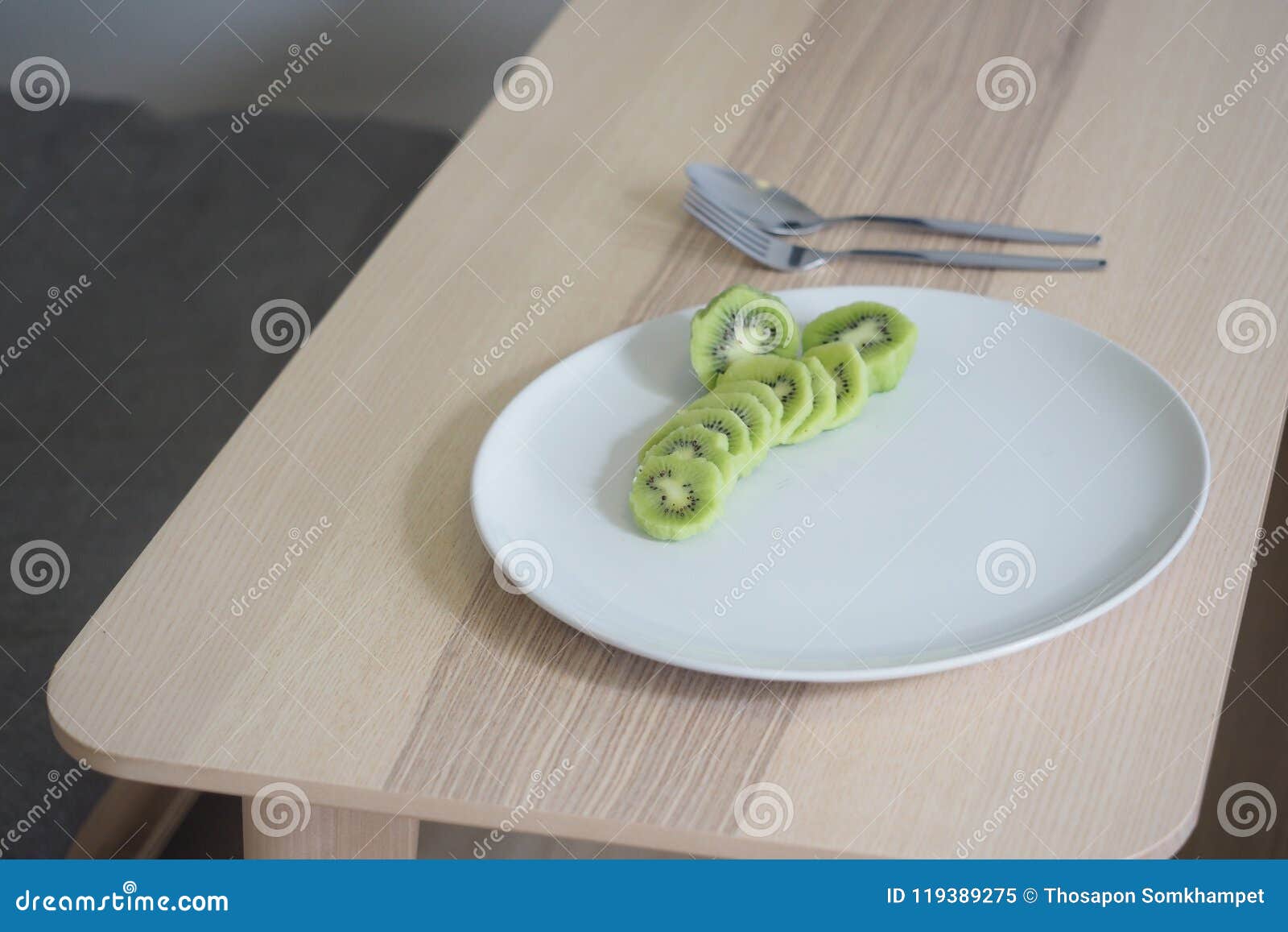 Kiwi fruit on white dish. stock image. Image of concept - 119389275