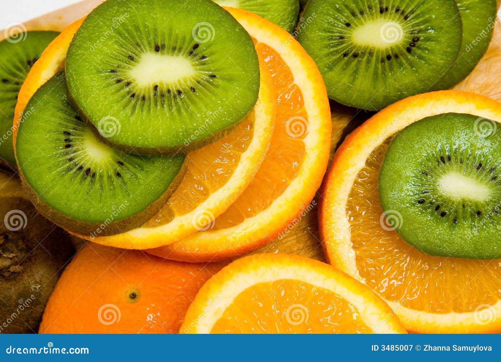 Kiwi and orange slices stock image. Image of dessert, juicy 3485007