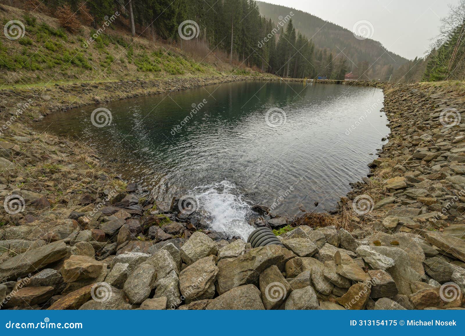 klinovecky creek and reservoirs near jachymov town in spring morning