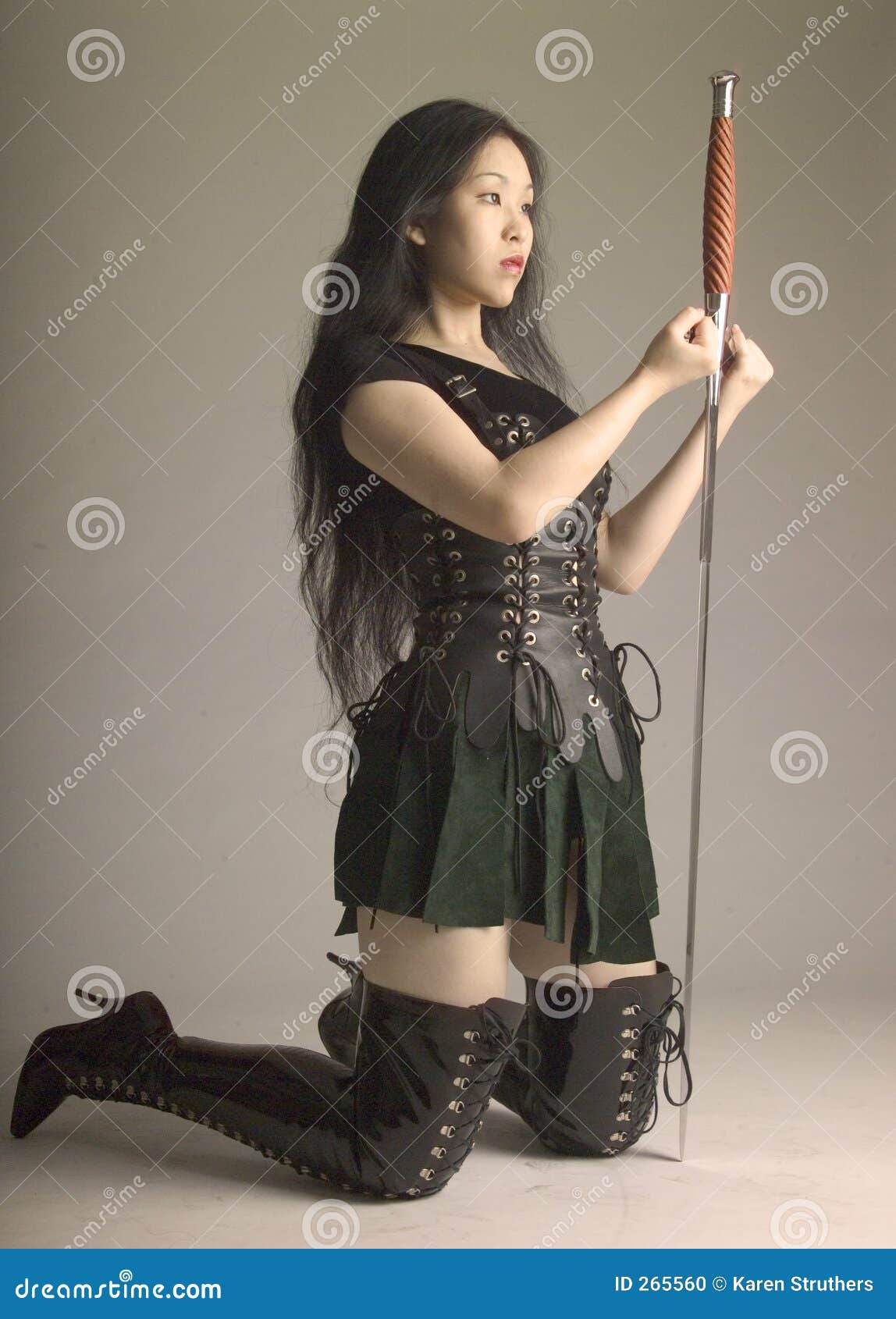 Kneeling Asian Warrior with Sword Stock Photo Image of long, pledge