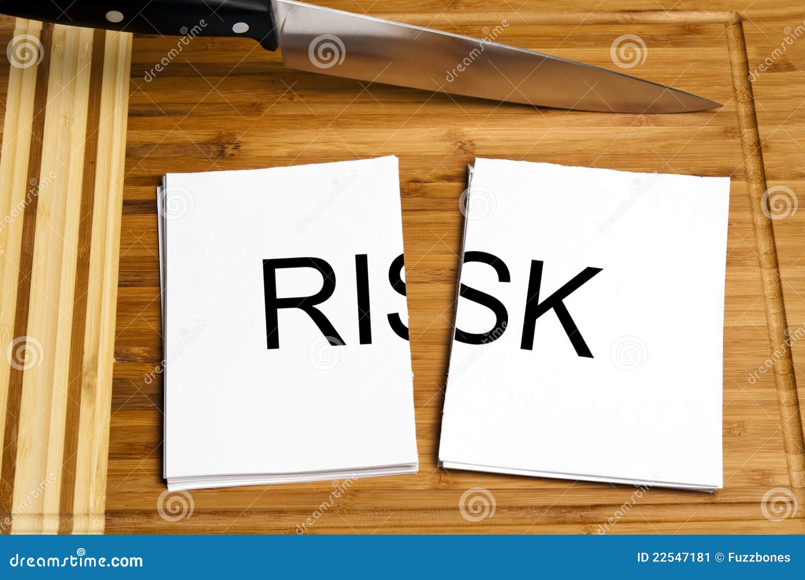 Knife cut paper with risk stock image. Image of security 22547181