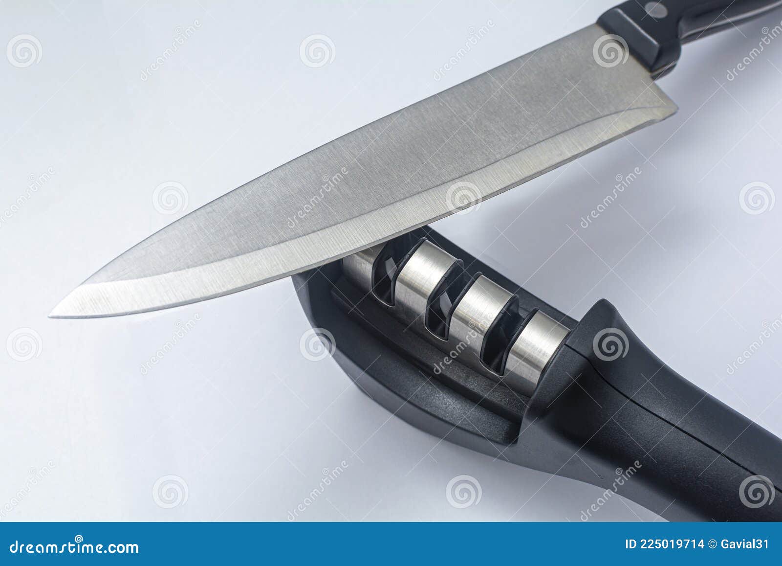 https://thumbs.dreamstime.com/z/knife-fillet-knife-reversible-manual-knife-sharpener-items-white-background-knife-fillet-knife-reversible-manual-225019714.jpg