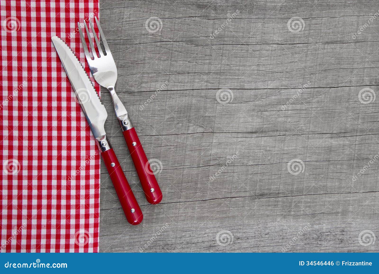 knife and fork - bavarian country style table decoration on a wooden background