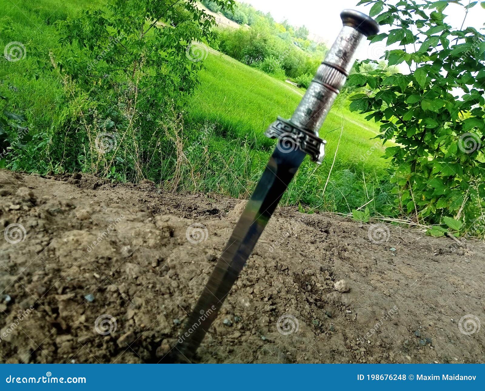 Knife in the ground stock photo. Image of poniard, ground 198676248