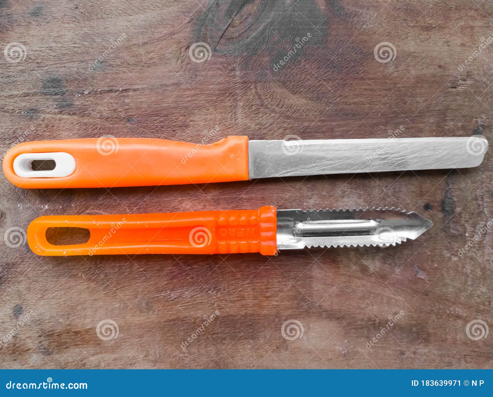 KNIFE and PEELER SET ORANGE KITCHEN TOOL Stock Image Image of cooking