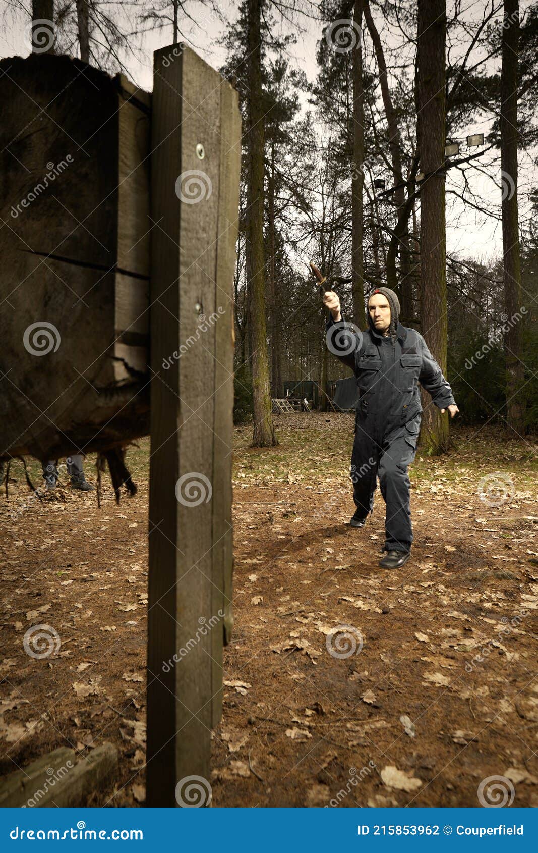 Knife Thrower in Training Session Practicing with Classic Weapon Stock