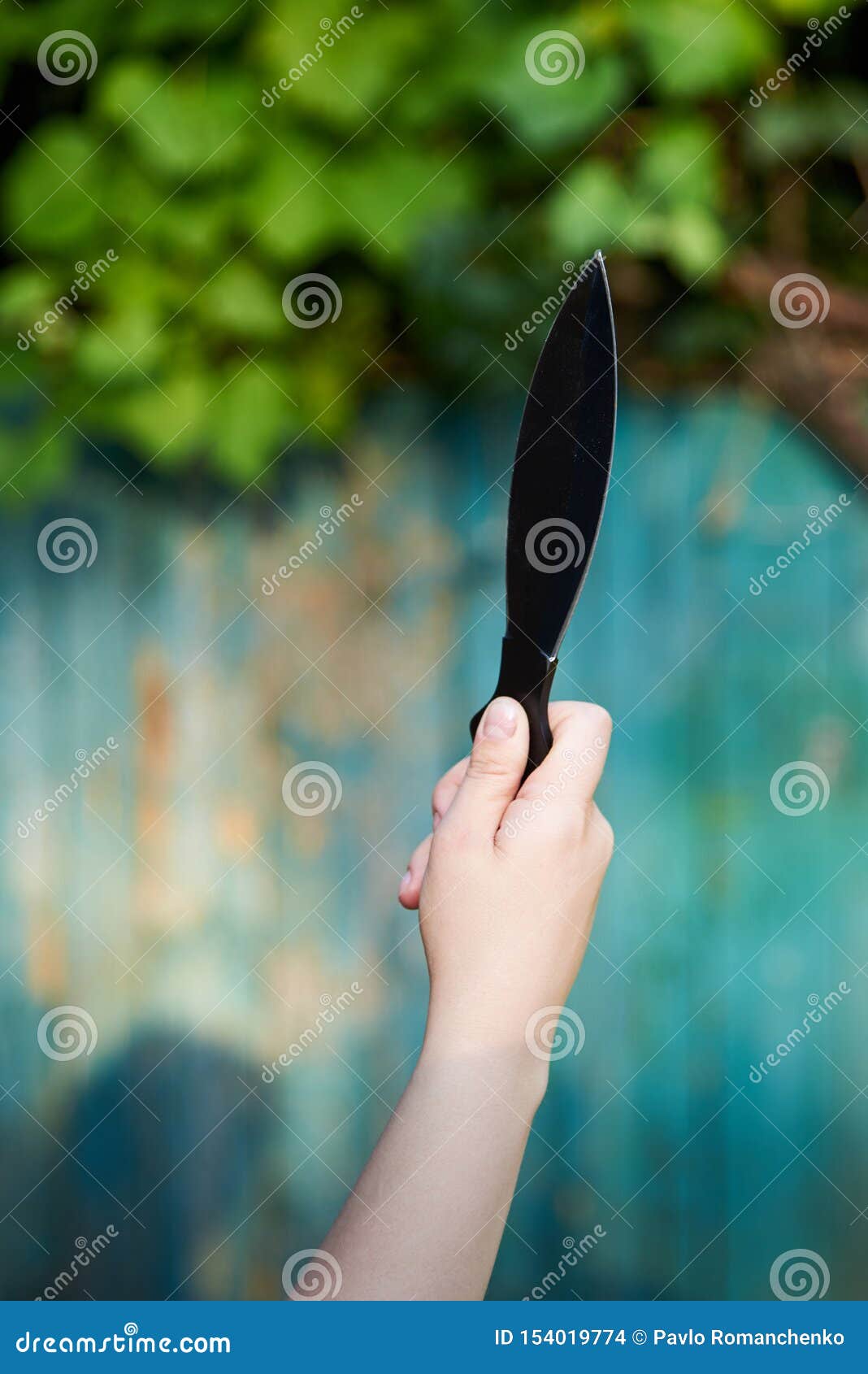 Knife for Throwing in the Hand of a Woman, Game for Active Recreation