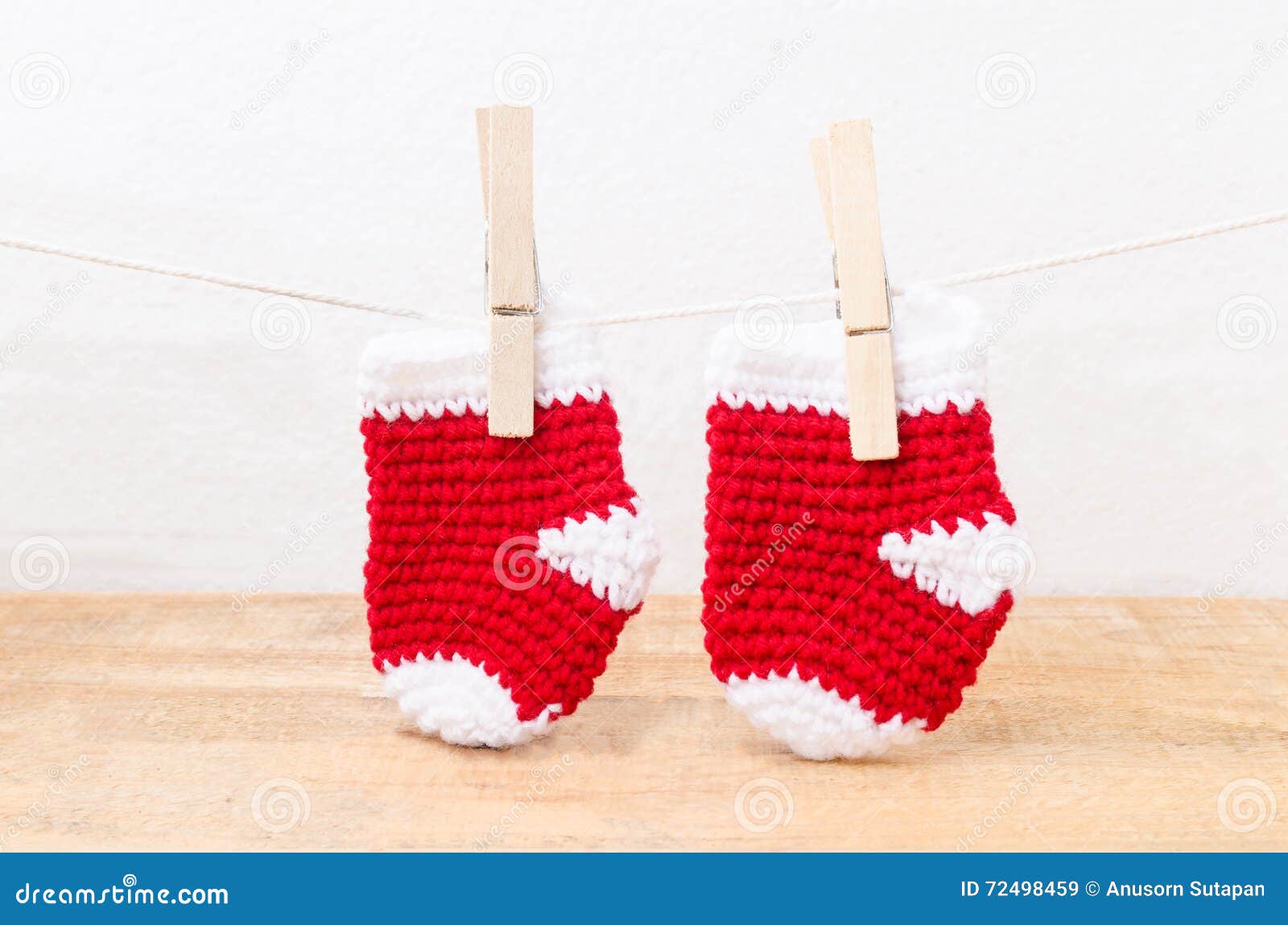 Knitted Baby Socks Hanging on the Clothesline Stock Image Image of