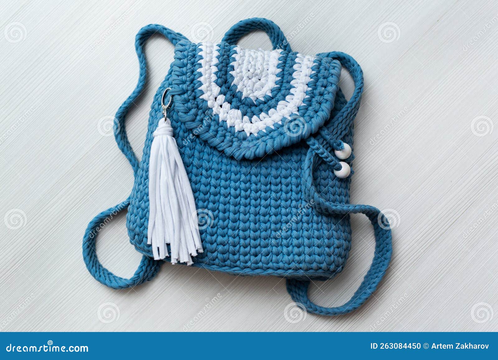 Knitted Blue Backpack on White Background. Stock Photo Image of