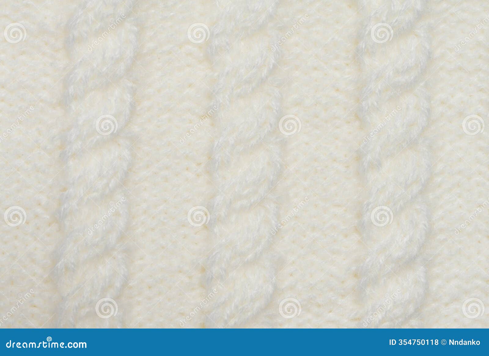 knitted fabric made of white wool threads, pigtail pattern, full frame