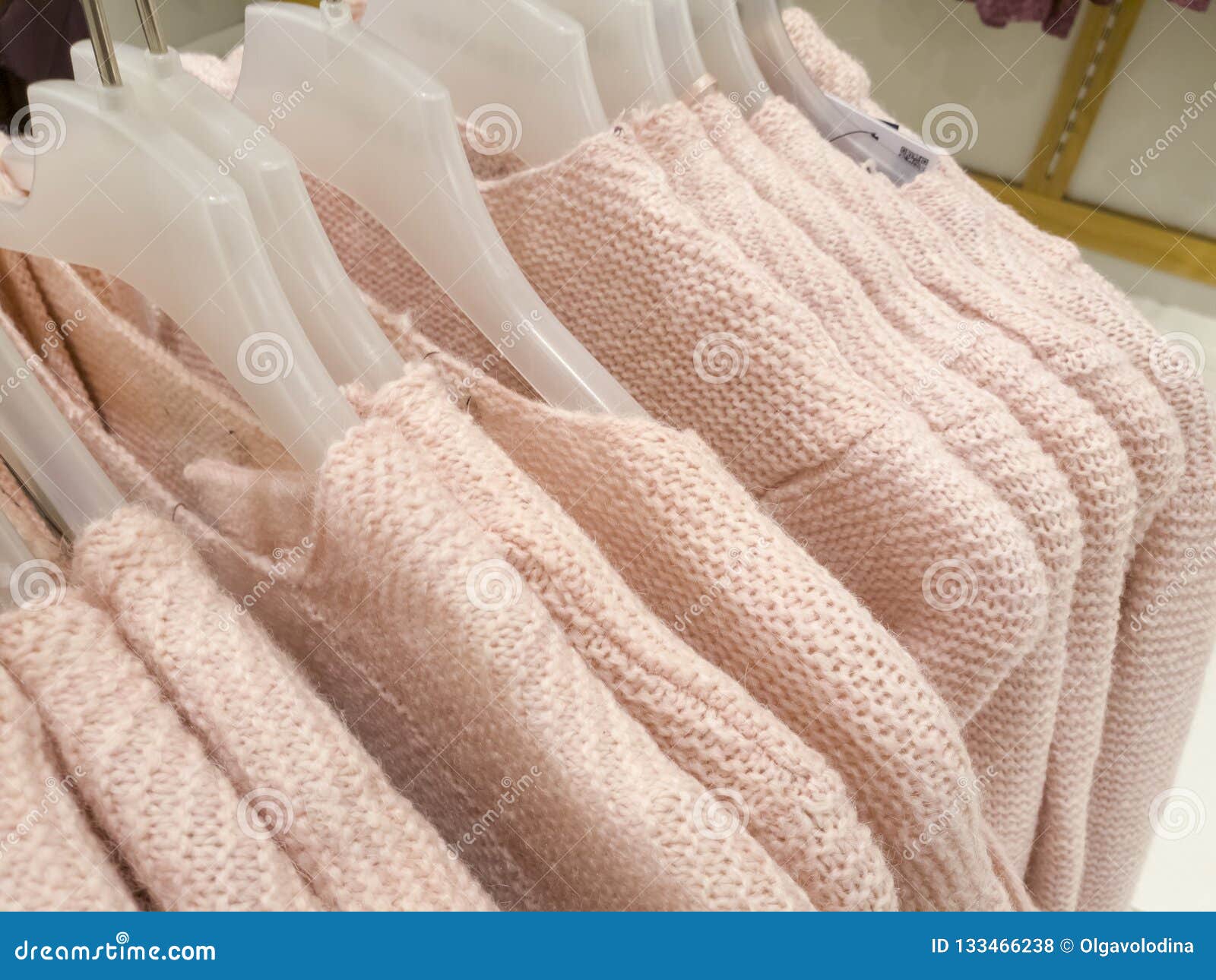 Knitted Woolen Sweaters on a Hanger in Store Stock Photo Image of