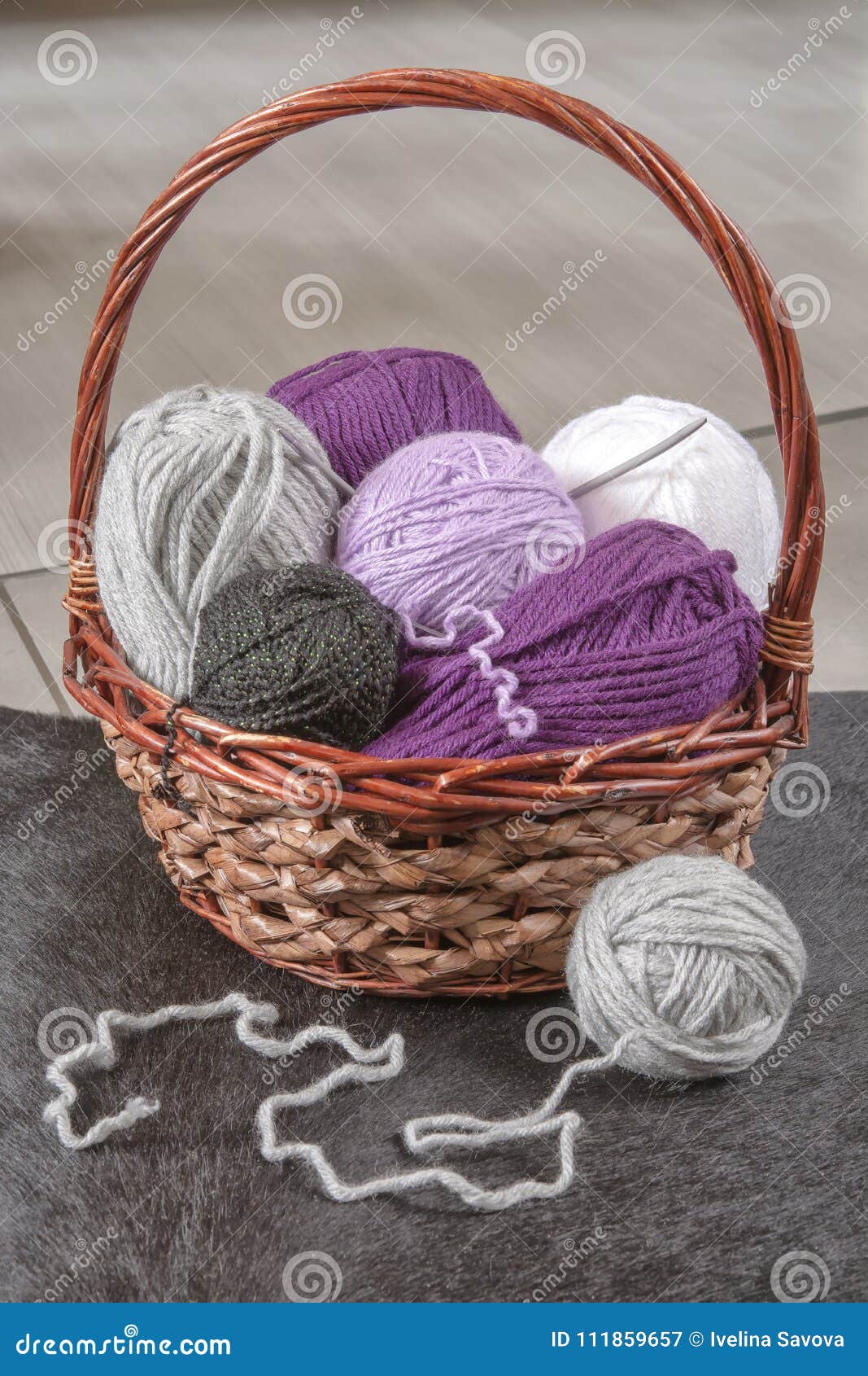 Knitting basket with yarns stock image. Image of color - 111859657