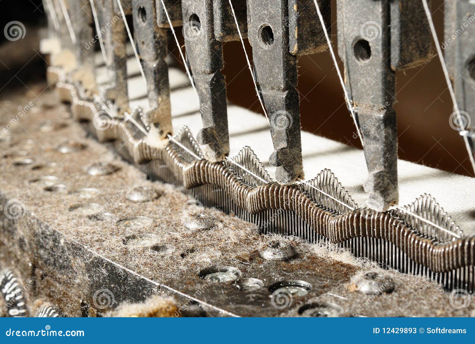 Knitting machine detail stock image. Image of industrial 12429893