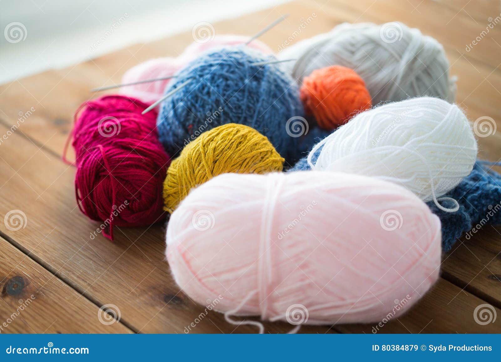 Knitting Needles and Balls of Yarn on Wood Stock Image Image of
