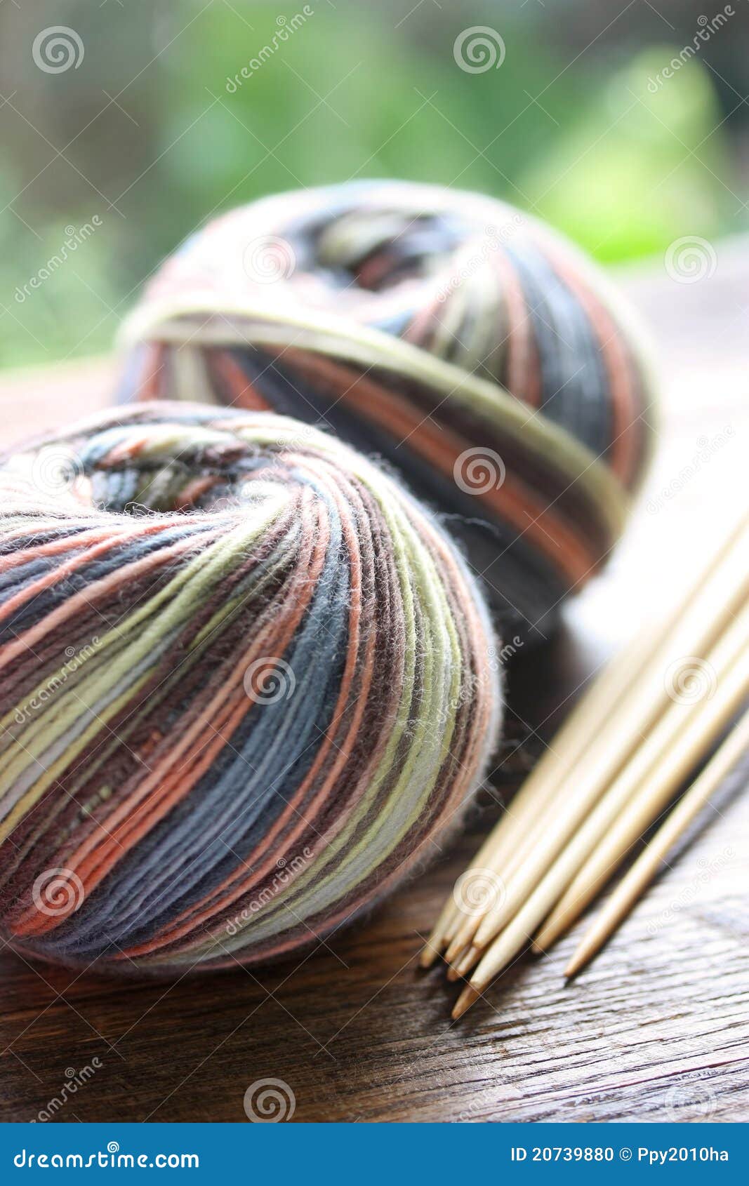 Knitting sock yarn balls with noodles , macro shot