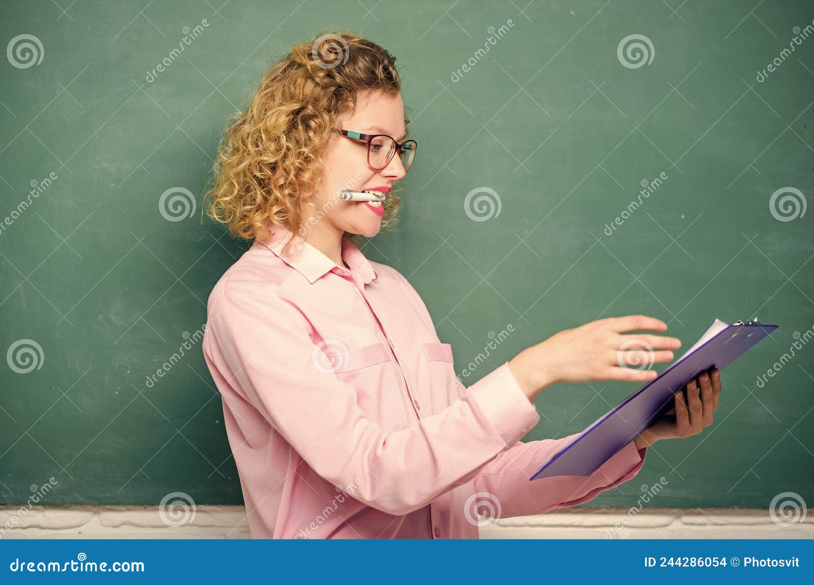 knowledge day. back to school. who is present today. call roll concept. woman school teacher hold folder documents. plan
