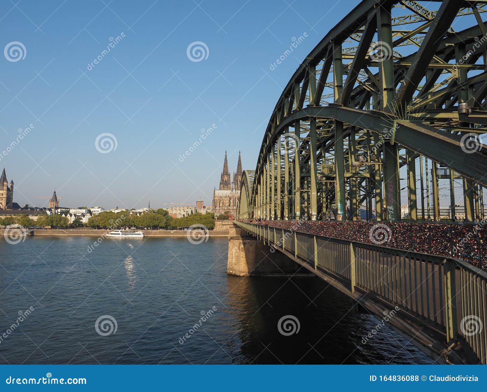 St Peter Cathedral And Hohenzollern Bridge Over River Rhine In K