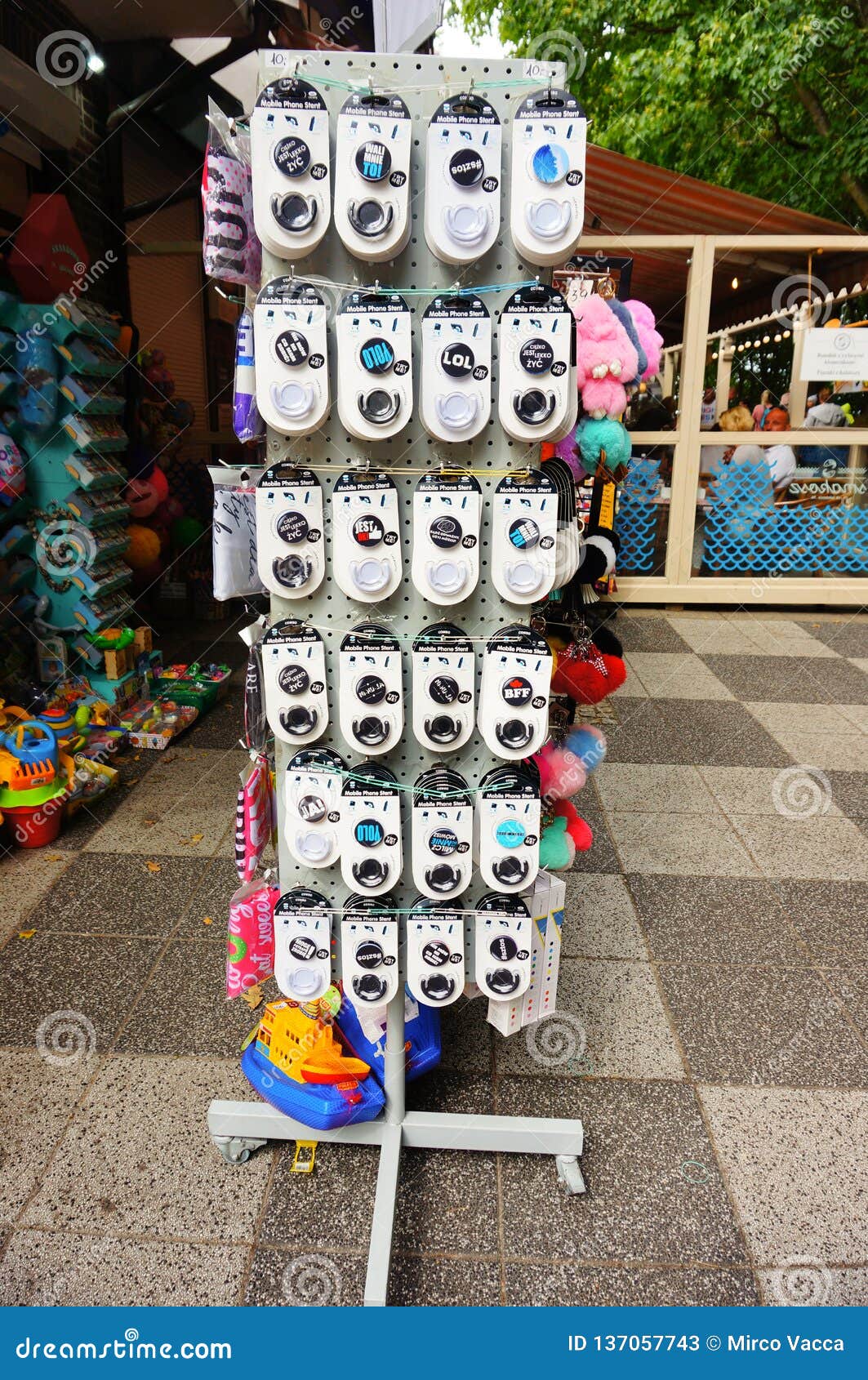 Mobile phone stands editorial stock photo. Image of holder - 137057743 Mobile phone stands editorial stock photo. Image of holder - 137057743