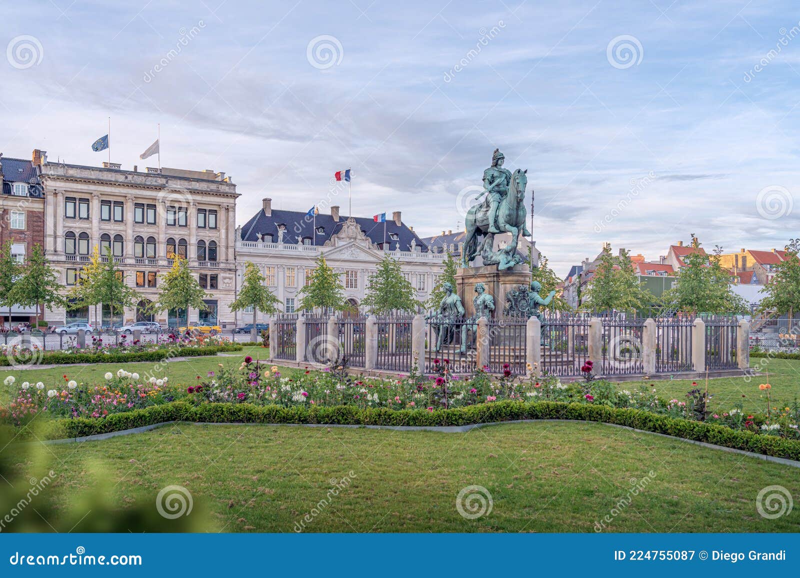 kongens nytorv square with christian v statue and thott mansion french embassy on background - copenhagen, denmark