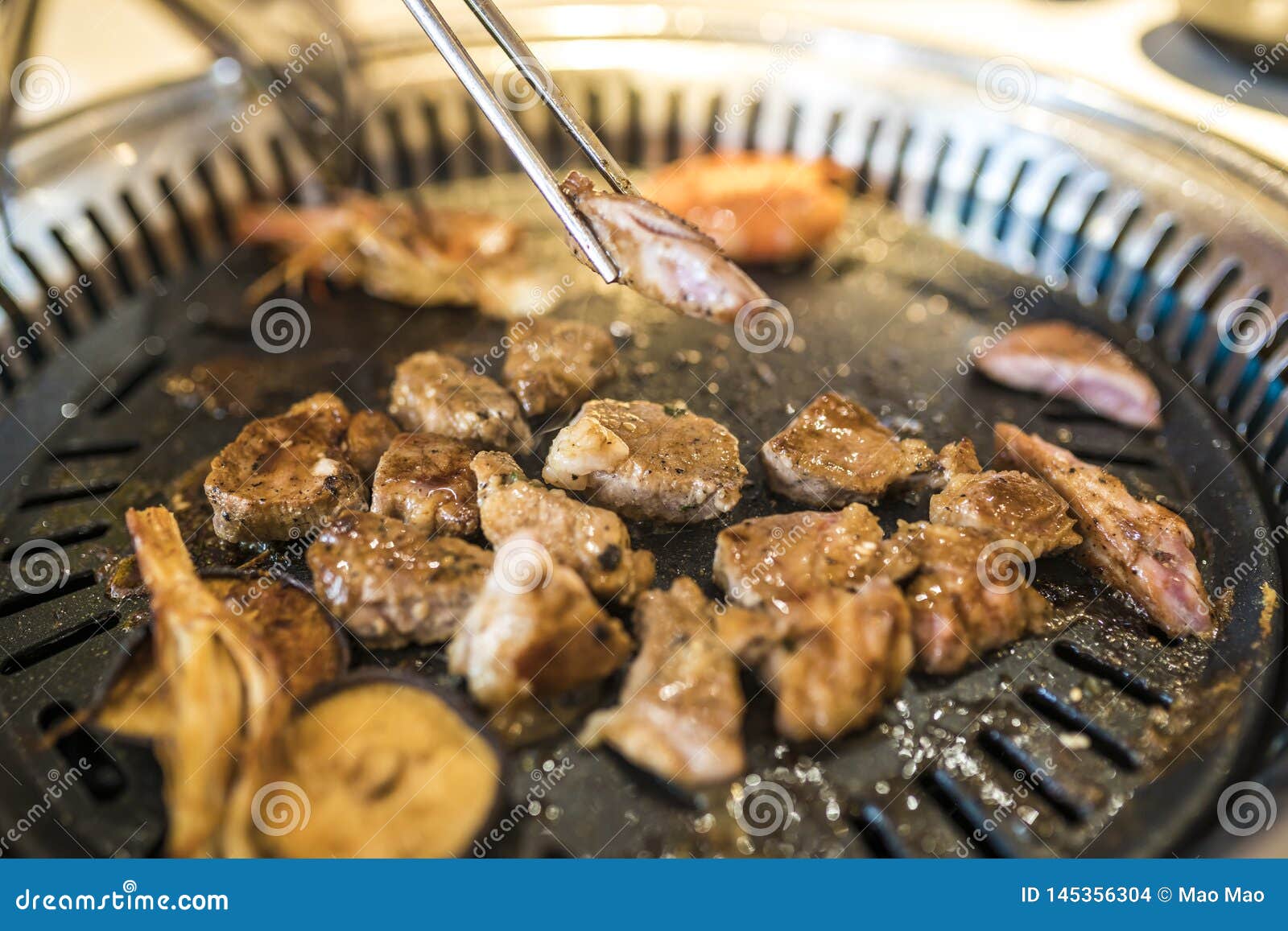 Korean Barbecue Meat are Being Cooked on Stove. Stock Photo Image