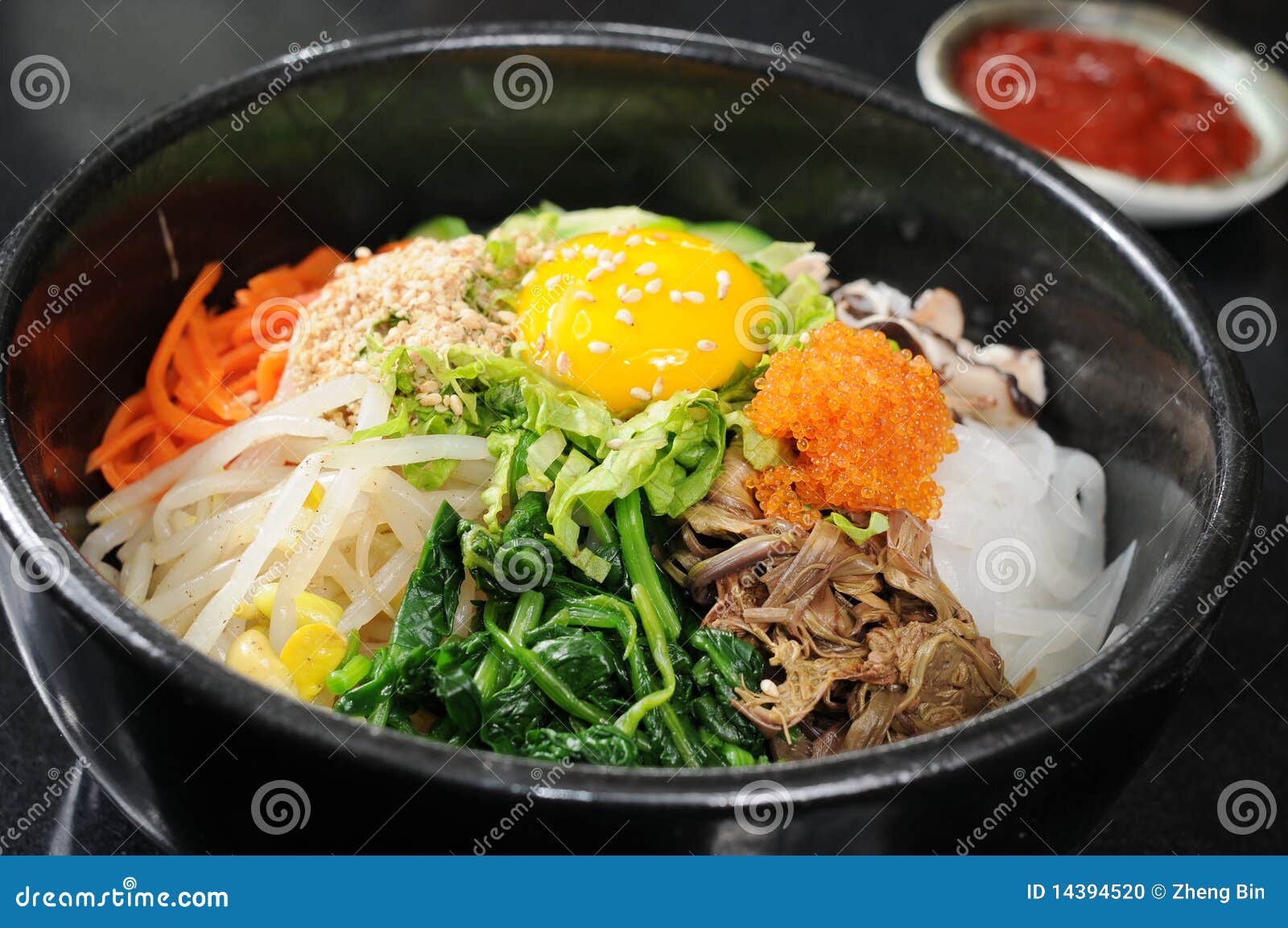 Korean Cuisine, Beef Bibimbap In A Clay Pot On Stock Photo