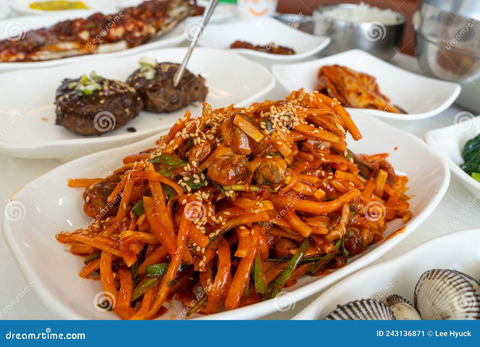 the korean food kkomak muchim means spicy cockles