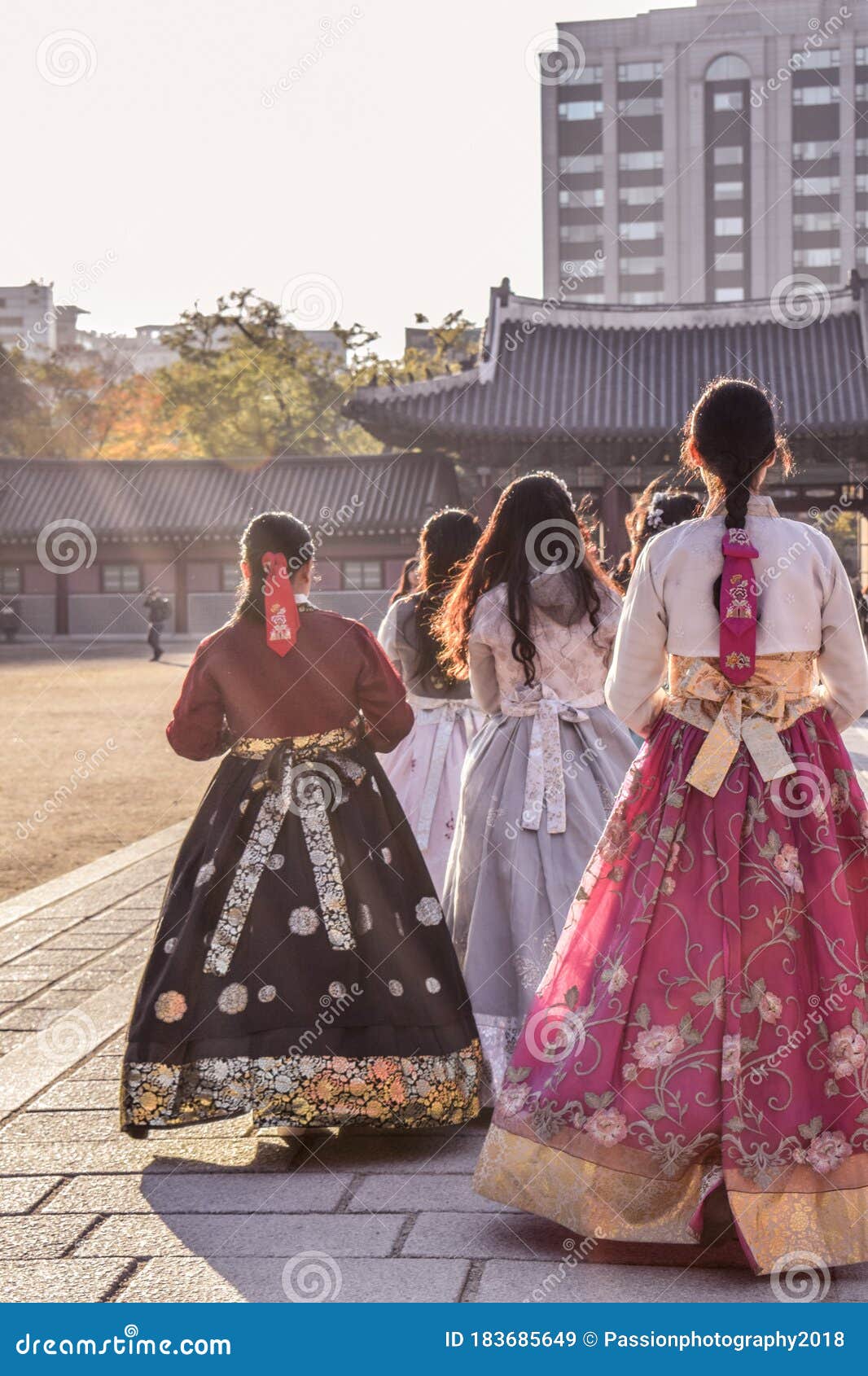 Pretty Korean girls wearing traditional Hanbok dress in Seoul