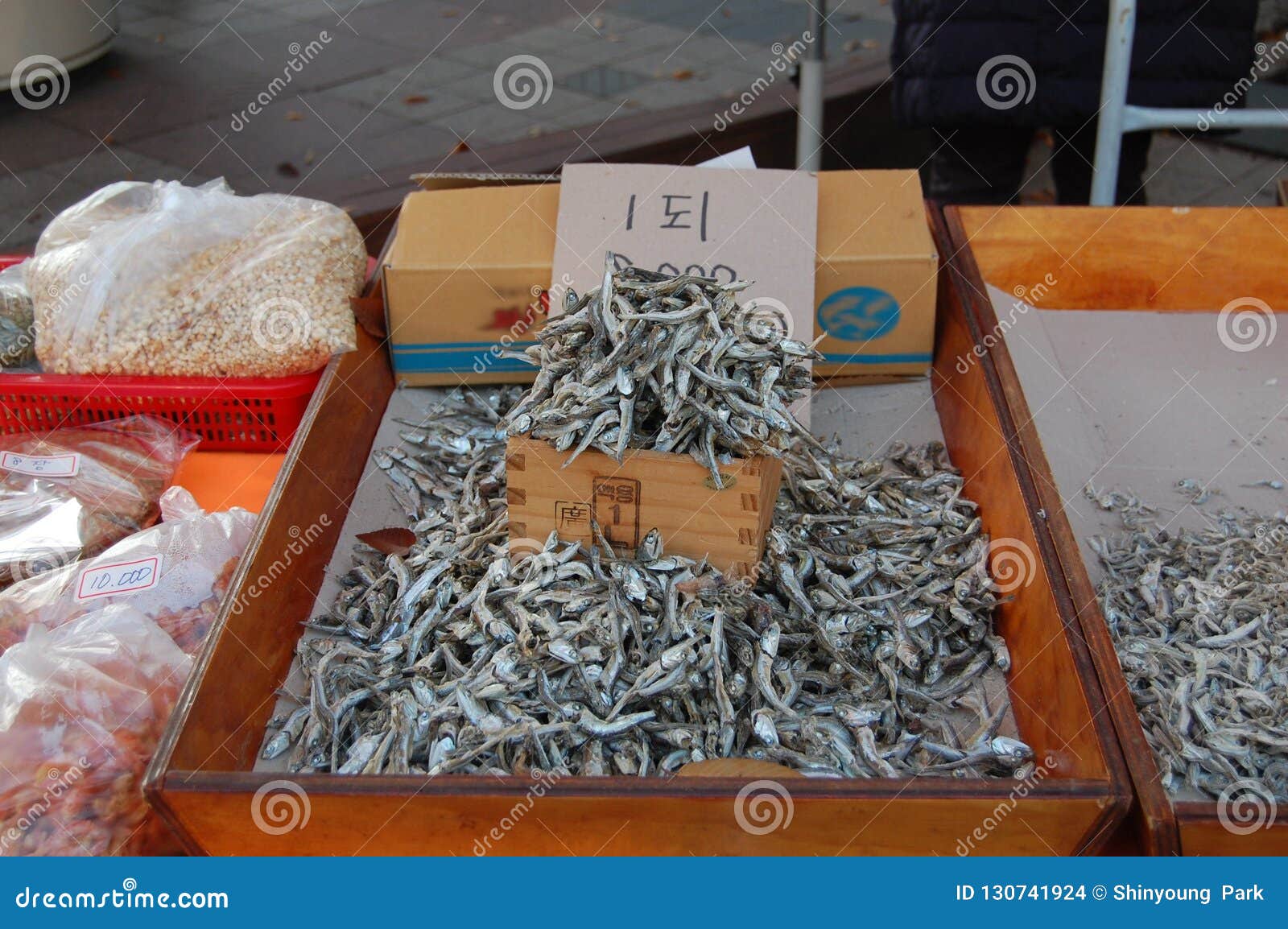 Korean Little Dried Fish Bokkeum Myeolchi Offerd On A Small Ma korean-little-dried-fish-bokkeum-myeolchi-offerd-on-a-small-ma