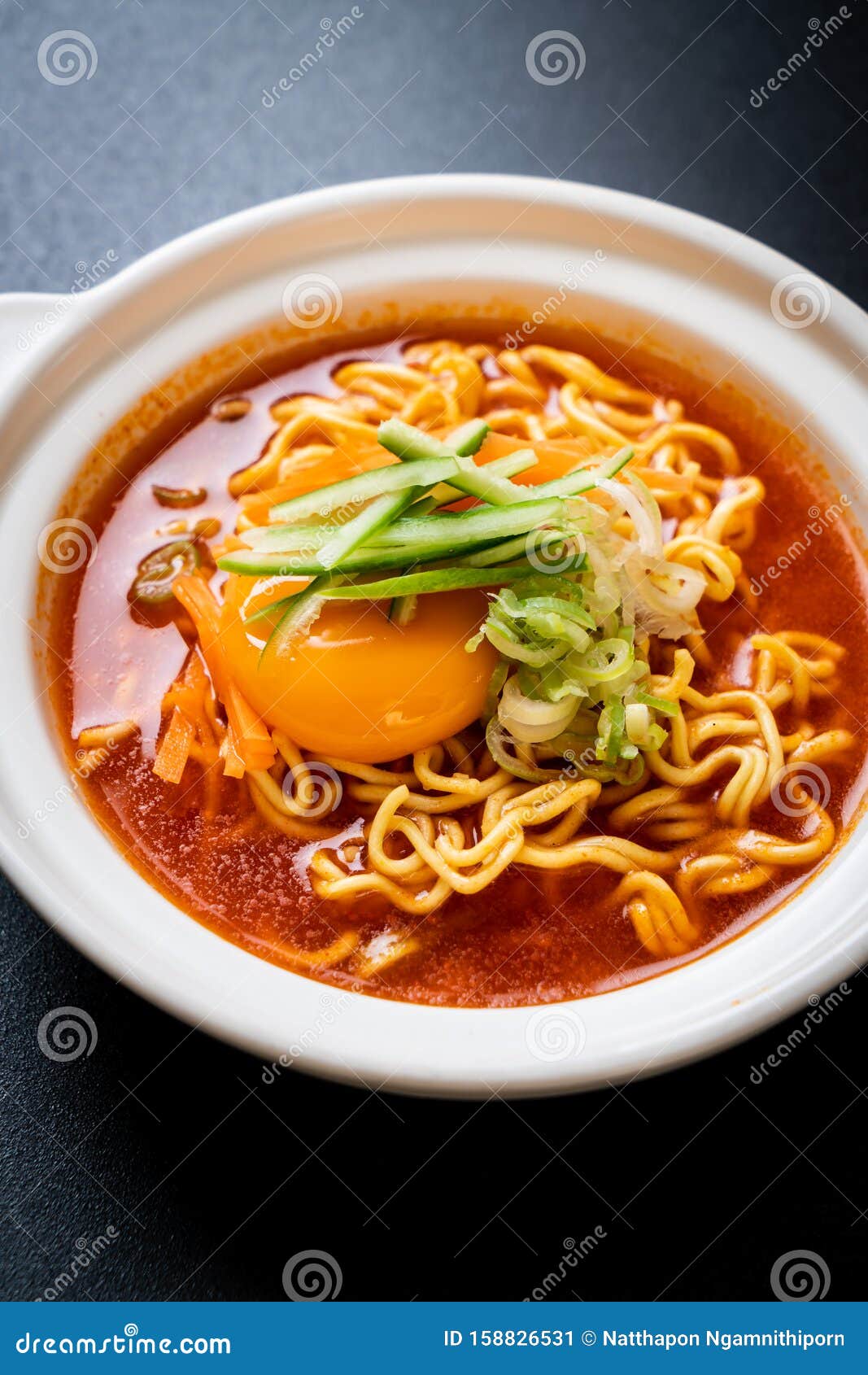 Korean Spicy Instant Noodles with Egg, Vegetable and Kimchi Stock Image