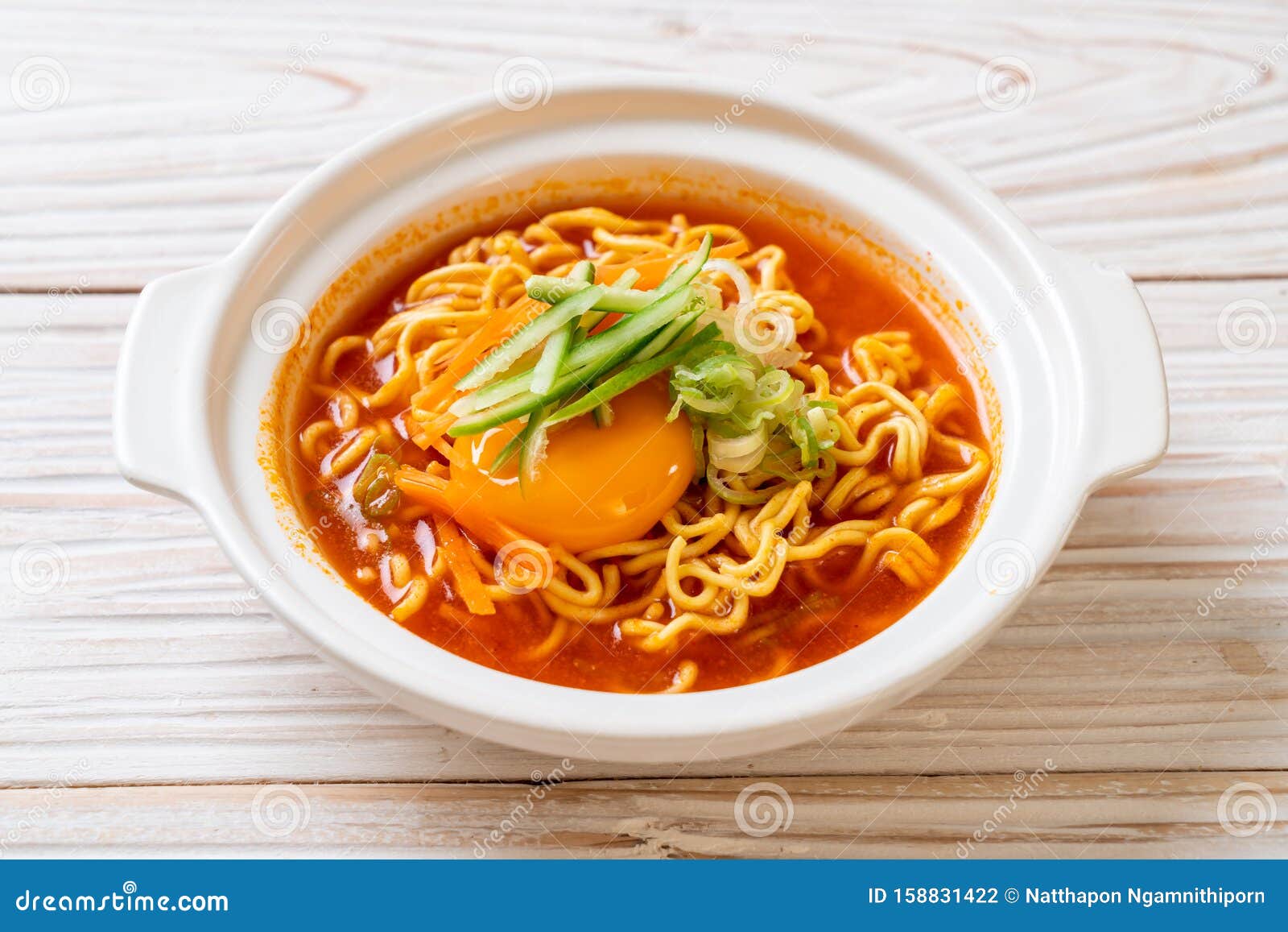 Korean Spicy Instant Noodles with Egg, Vegetable and Kimchi Stock Photo